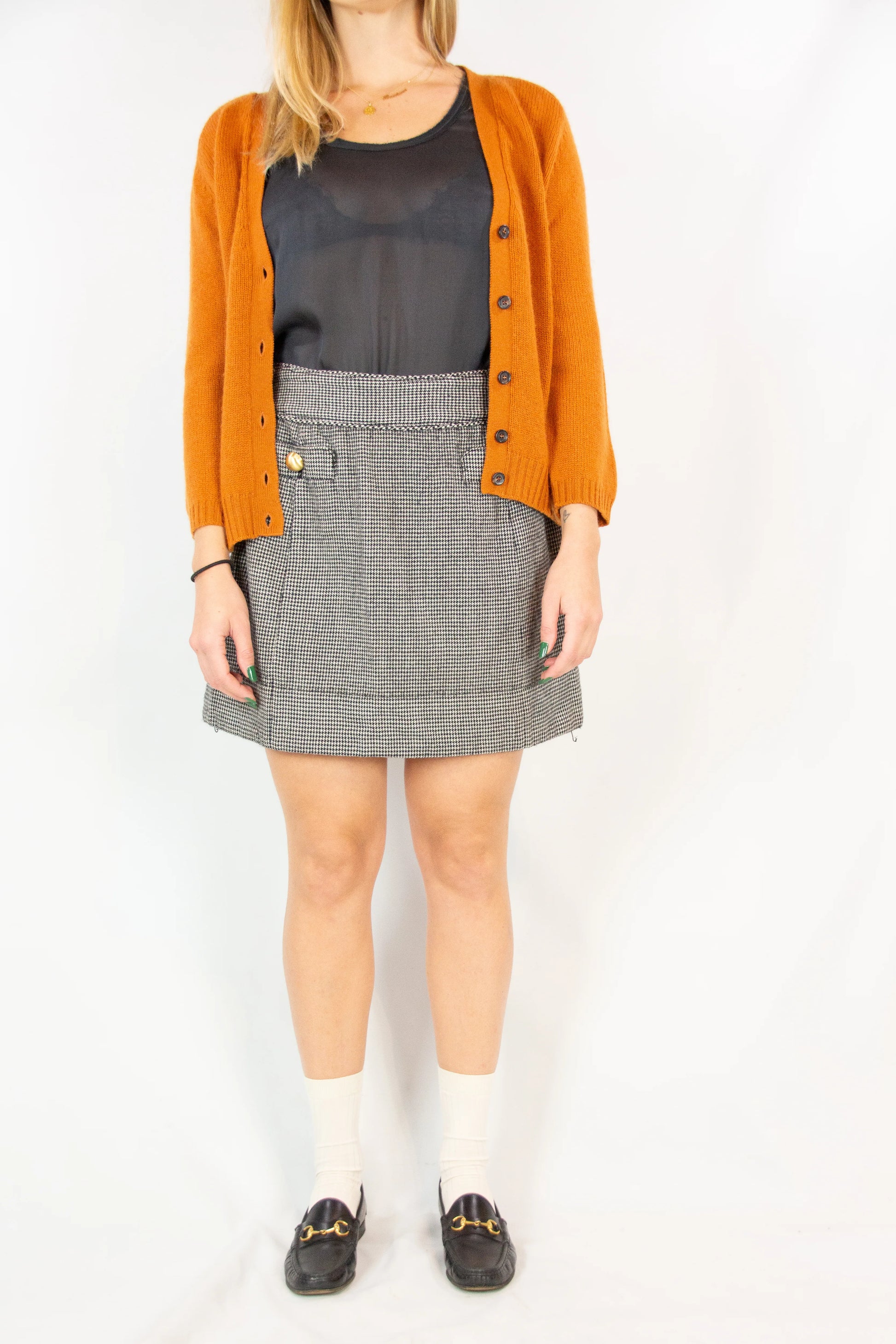 Pied de poule miniskirt with golden buttons