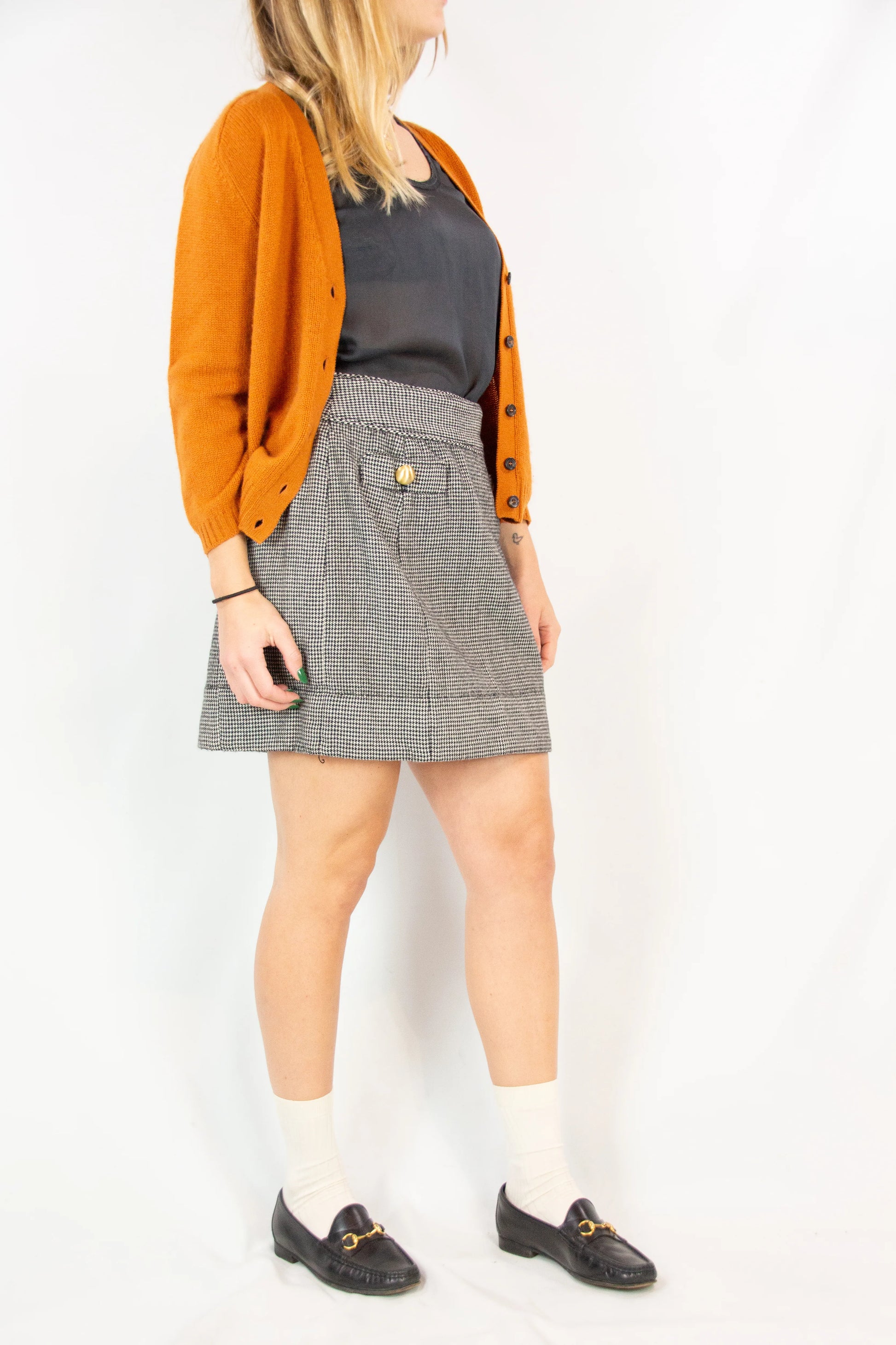 Pied de poule miniskirt with golden buttons