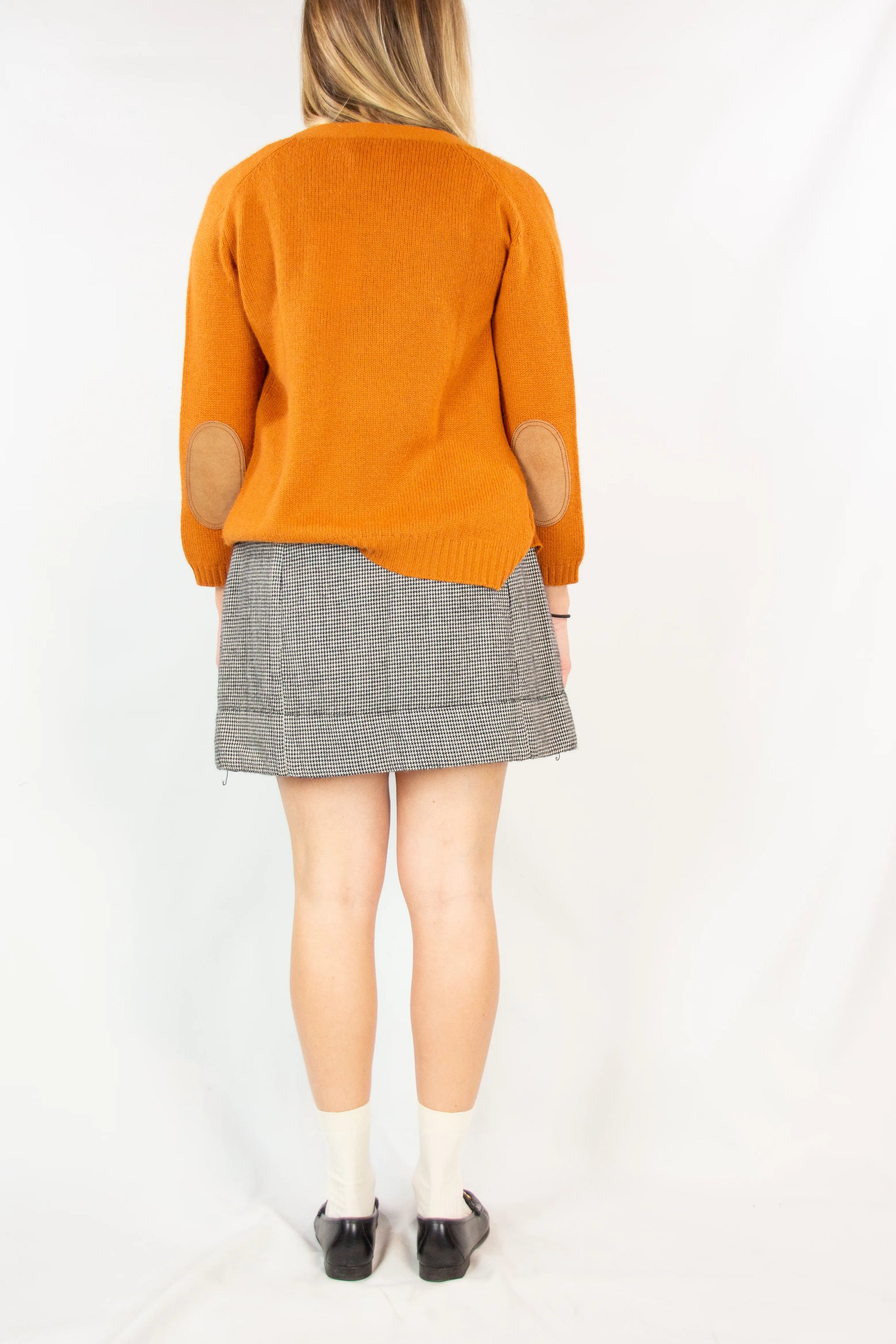 Pied de poule miniskirt with golden buttons