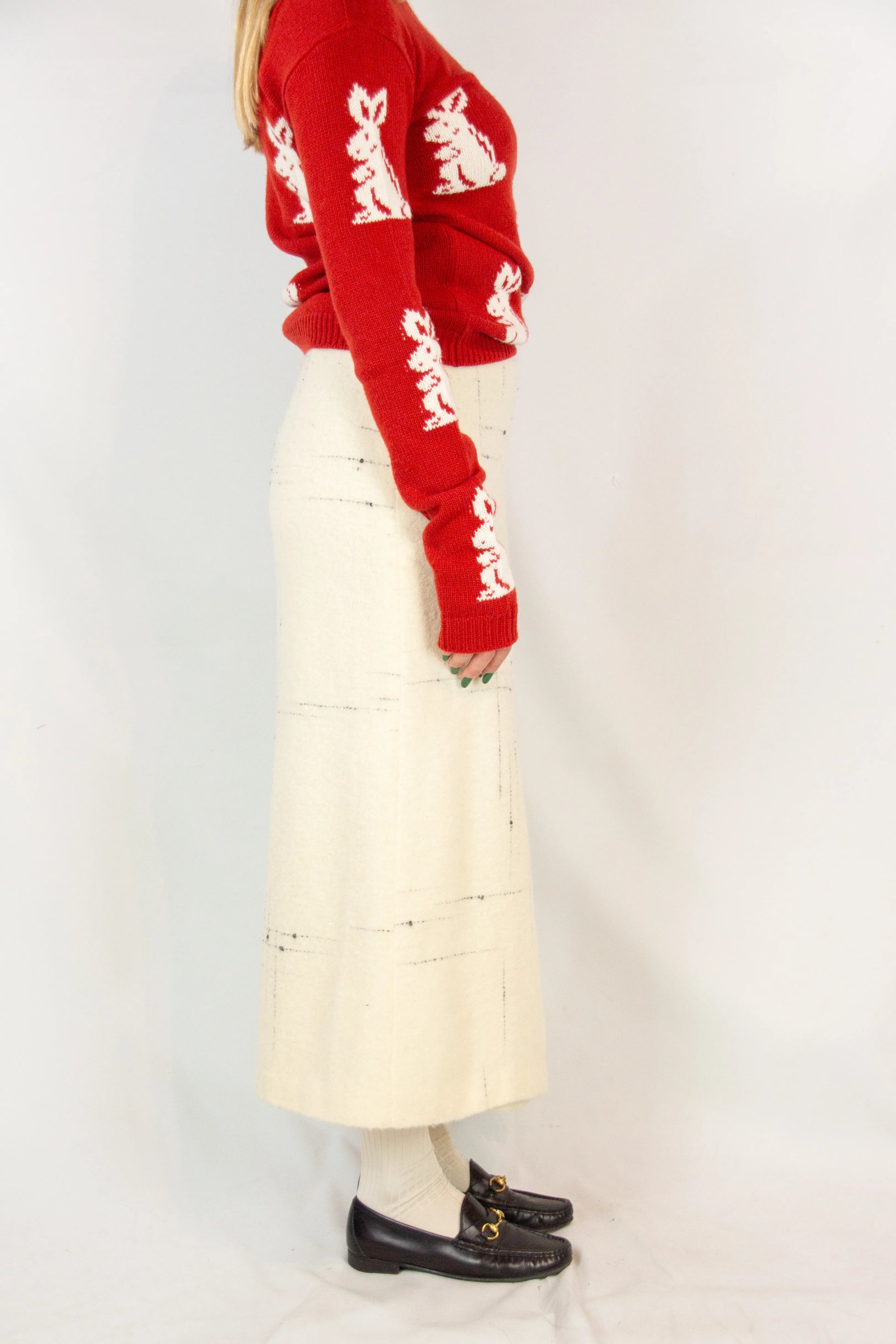 Wool wrap skirt with black stitching and leather closure