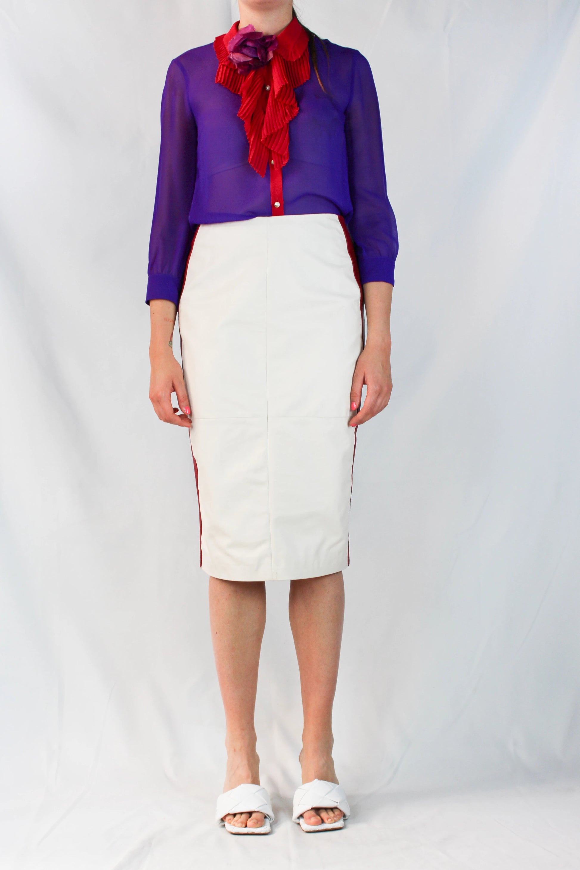 Leather and navy jersey pencil skirt with red trims