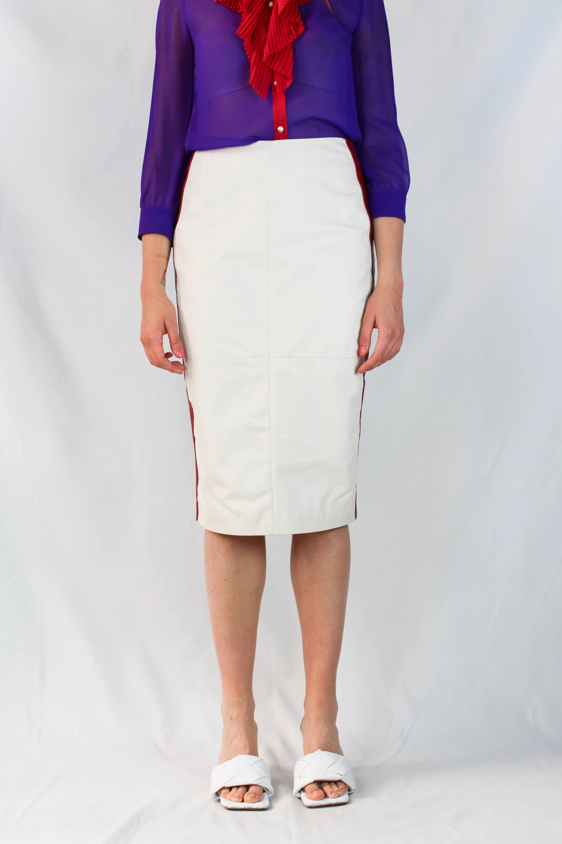 Leather and navy jersey pencil skirt with red trims