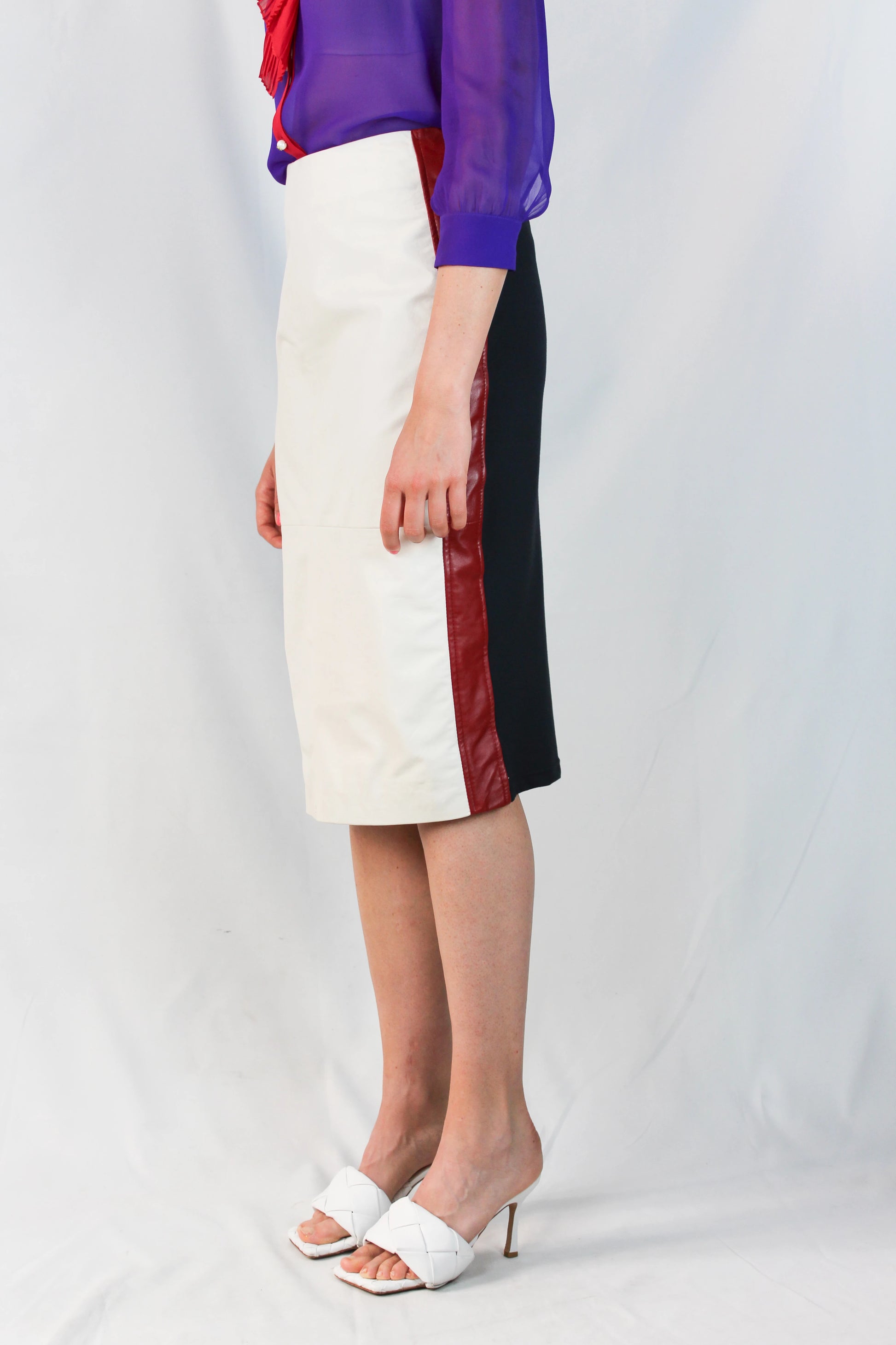 Leather and navy jersey pencil skirt with red trims