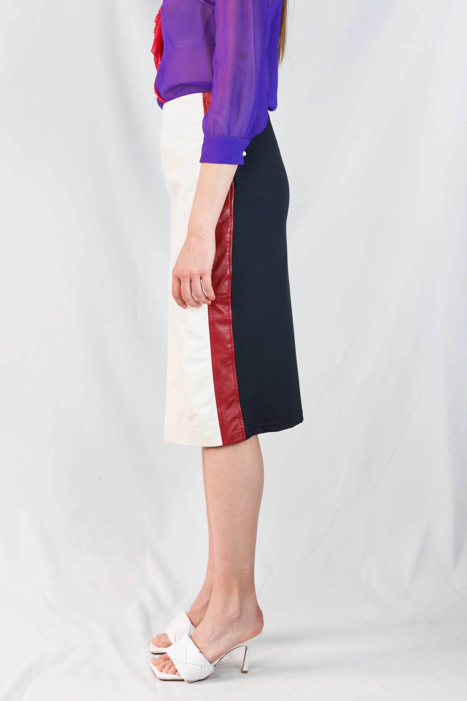 Leather and navy jersey pencil skirt with red trims