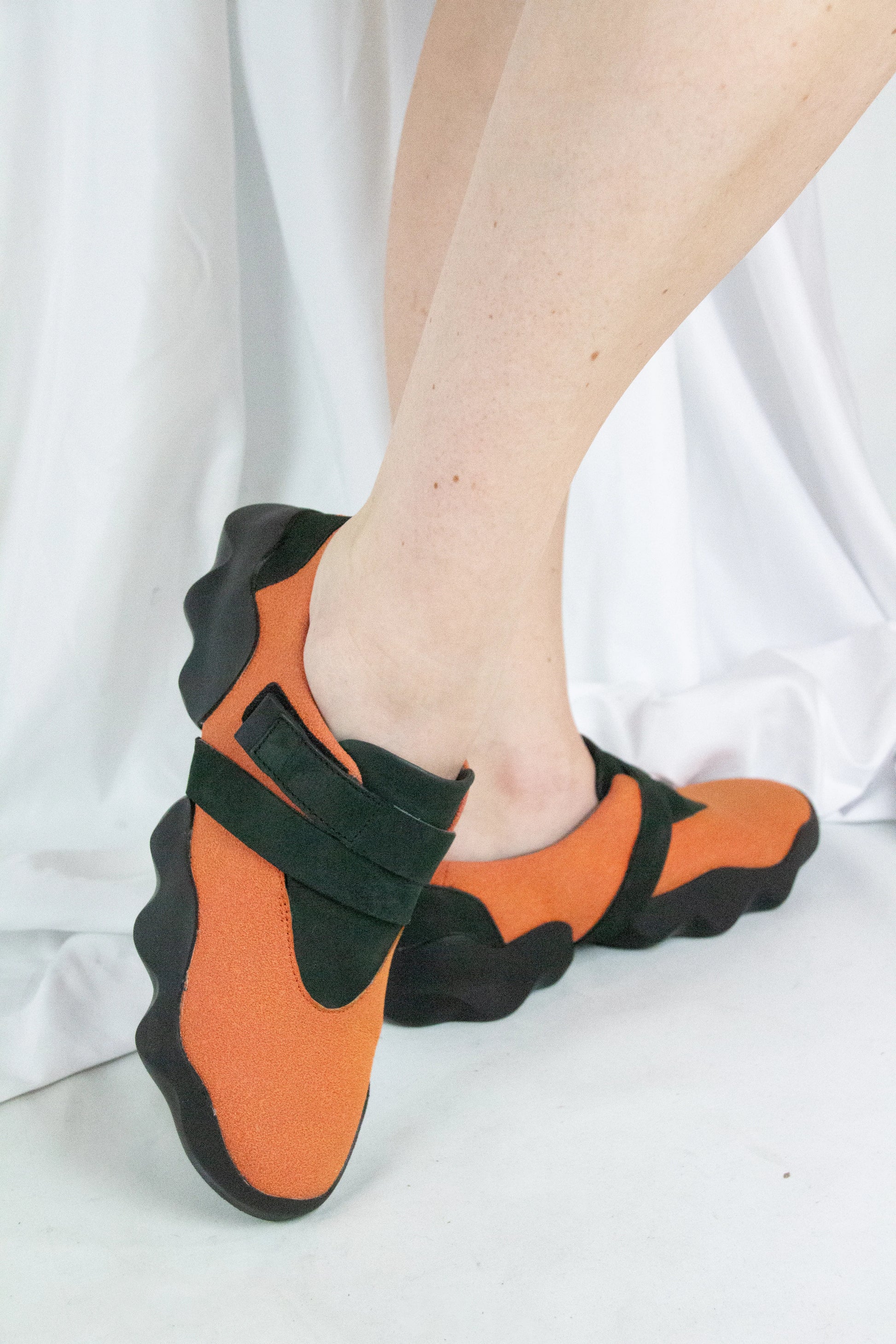 Orange Sneakers with Black Details