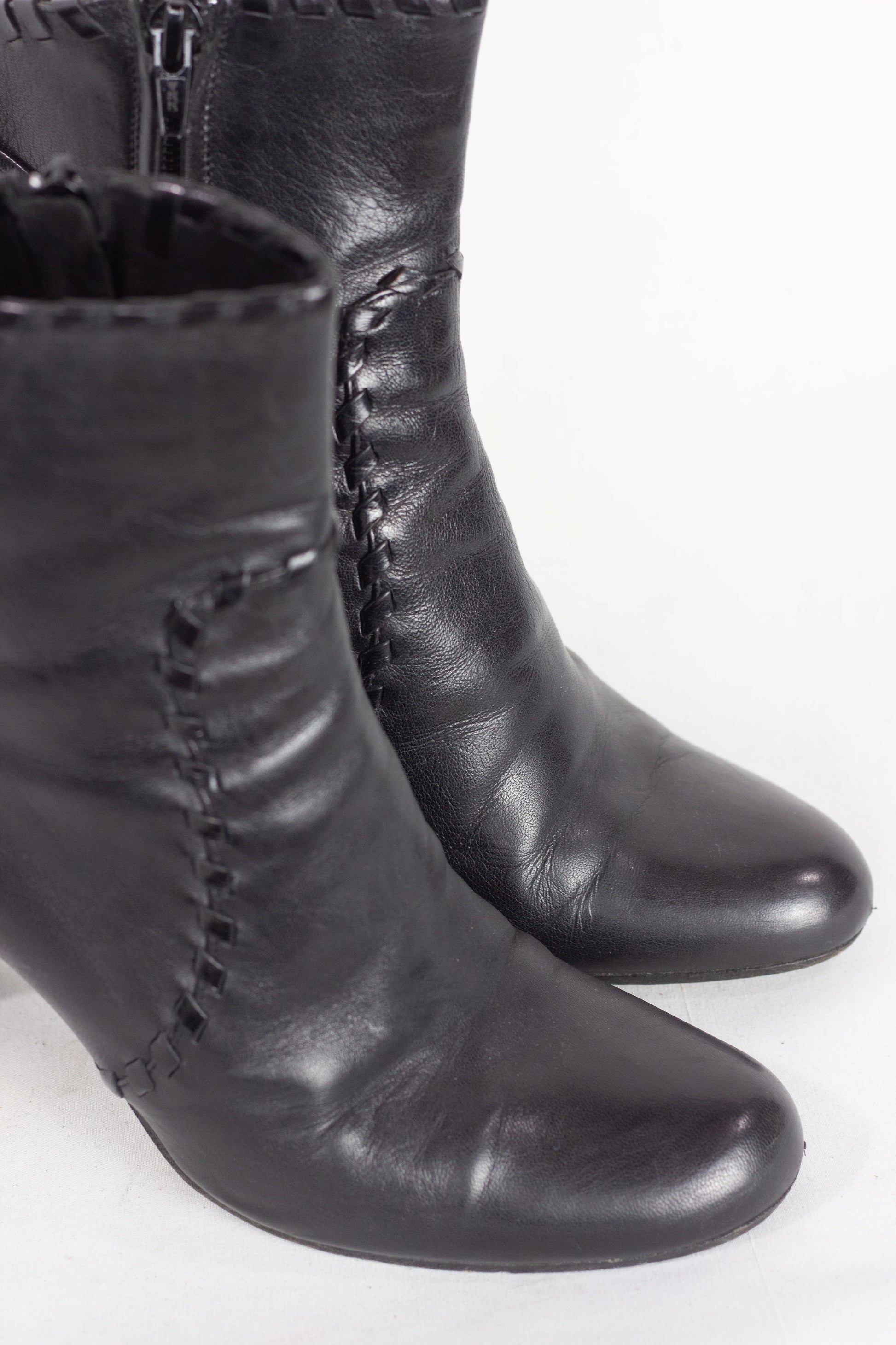 Black Leather Ankle Boots with Decorative Stitching