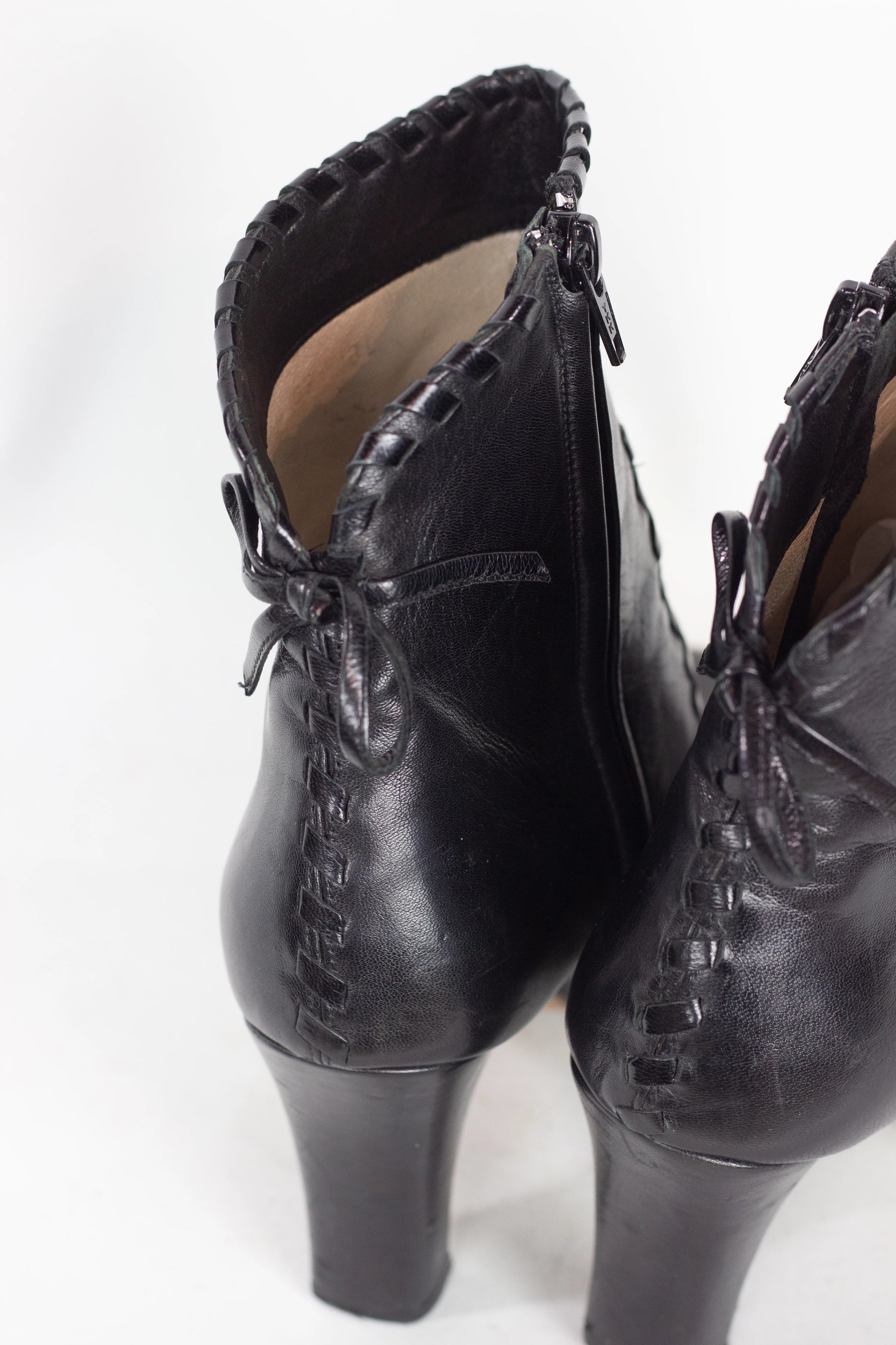 Black Leather Ankle Boots with Decorative Stitching