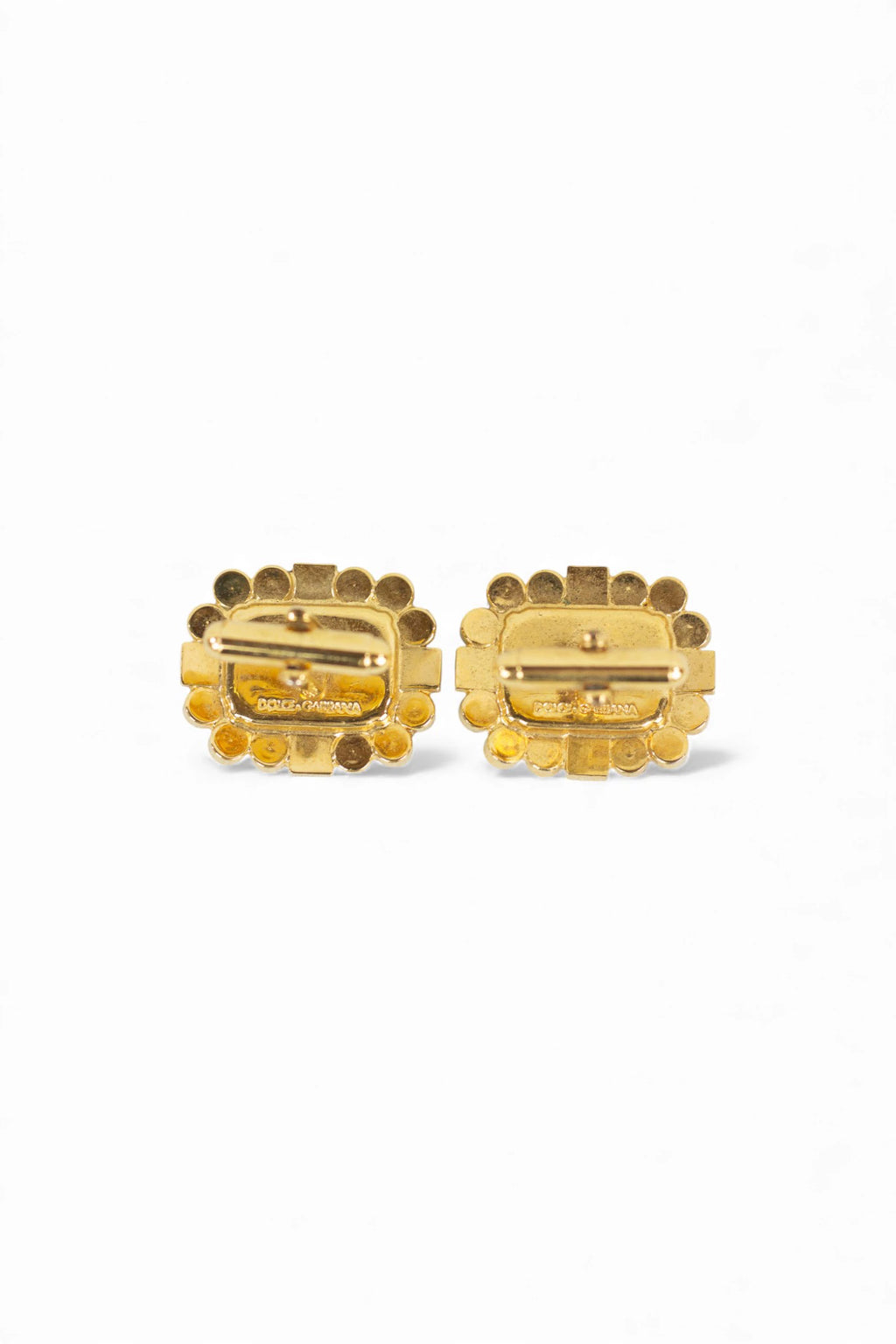 Gems and golden cufflinks