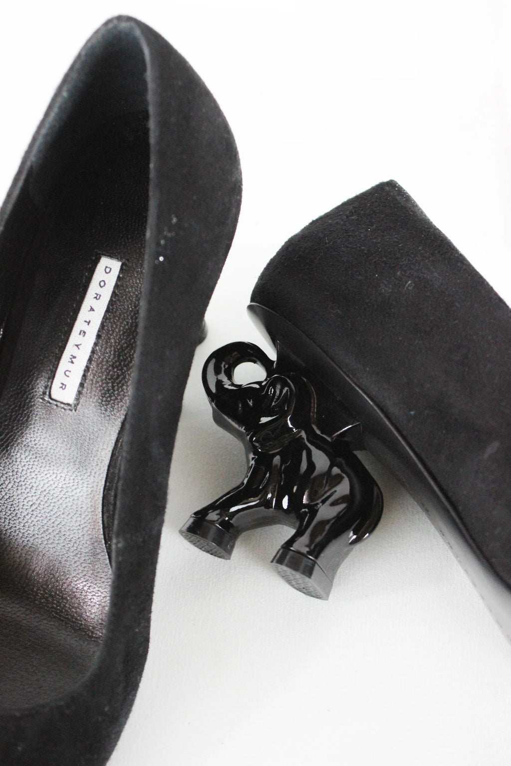 Suede elephant heel pumps