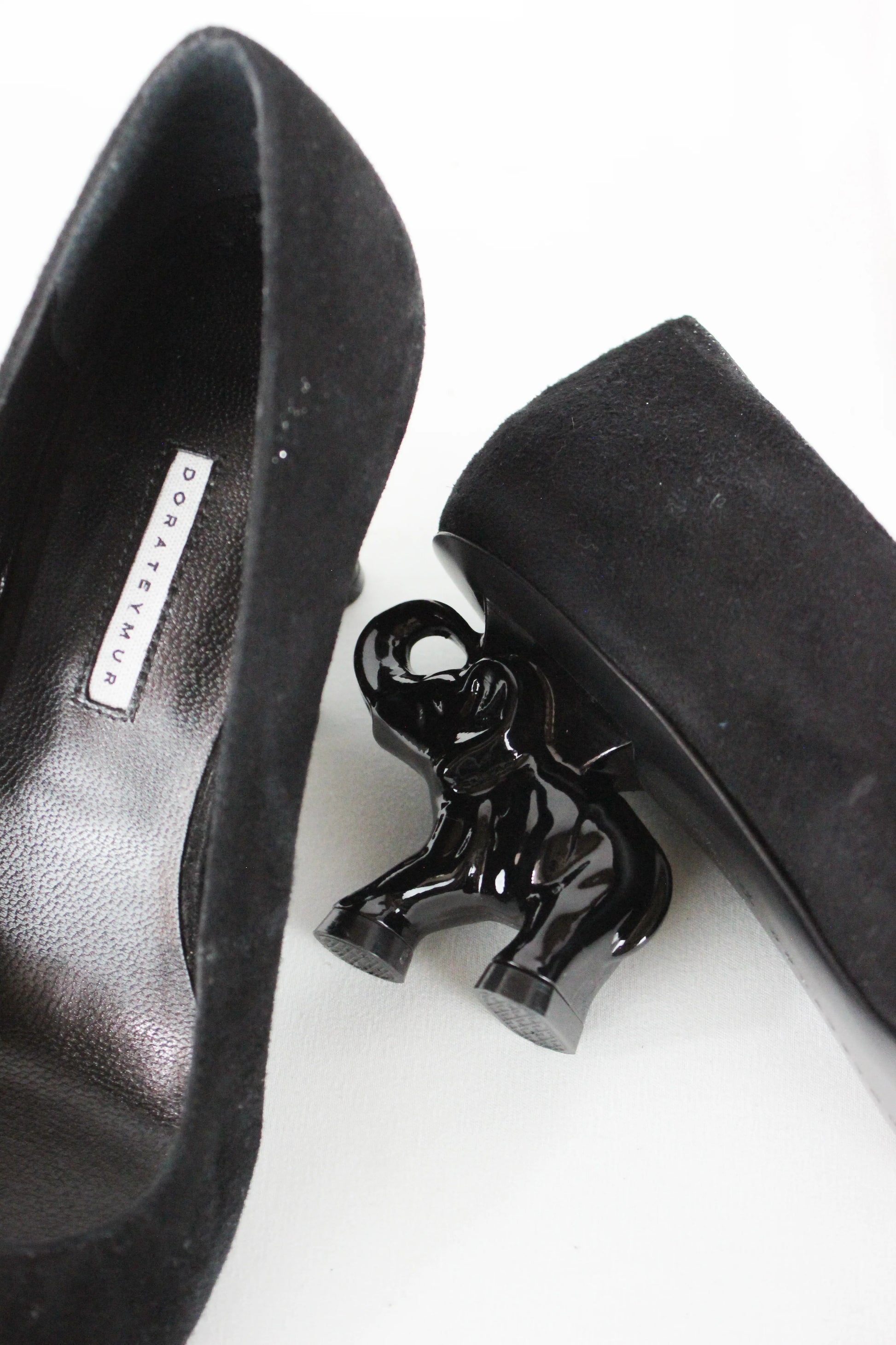 Suede elephant heel pumps