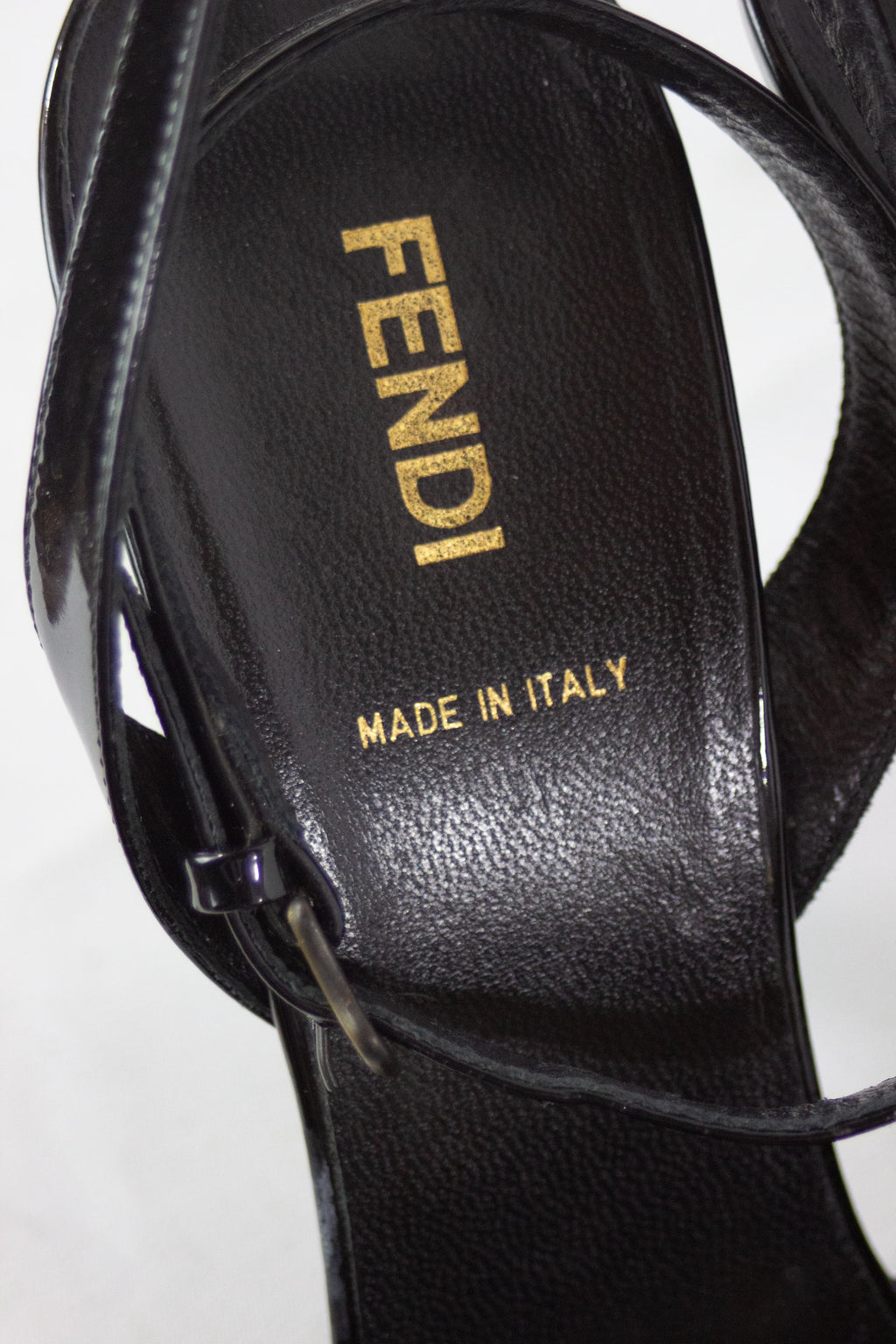 Black patent sandals with buckle decor