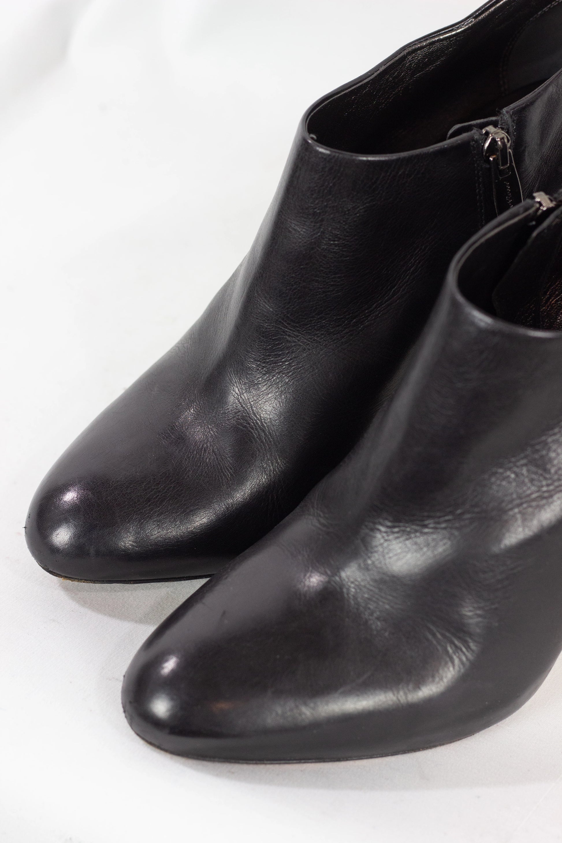 Black leather ankle boots