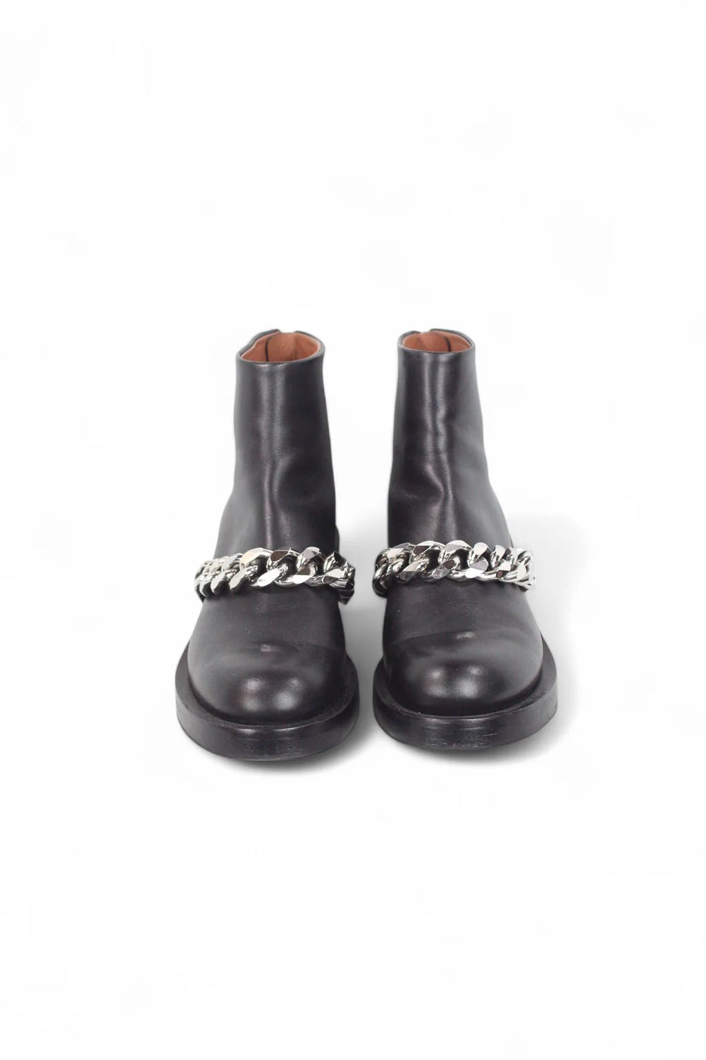 Black leather ankle boots with chain detail