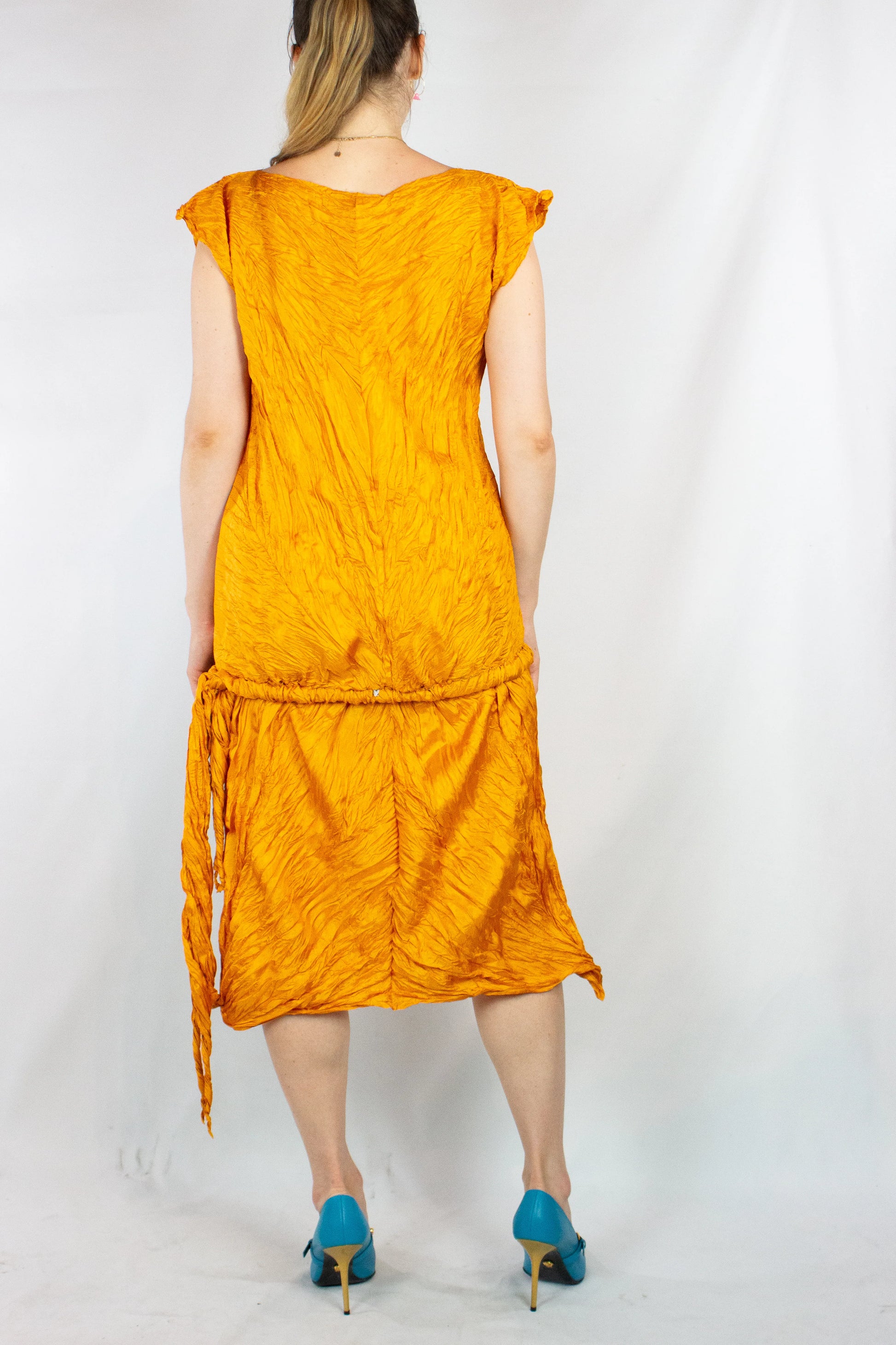 Orange crinkled pleats dress