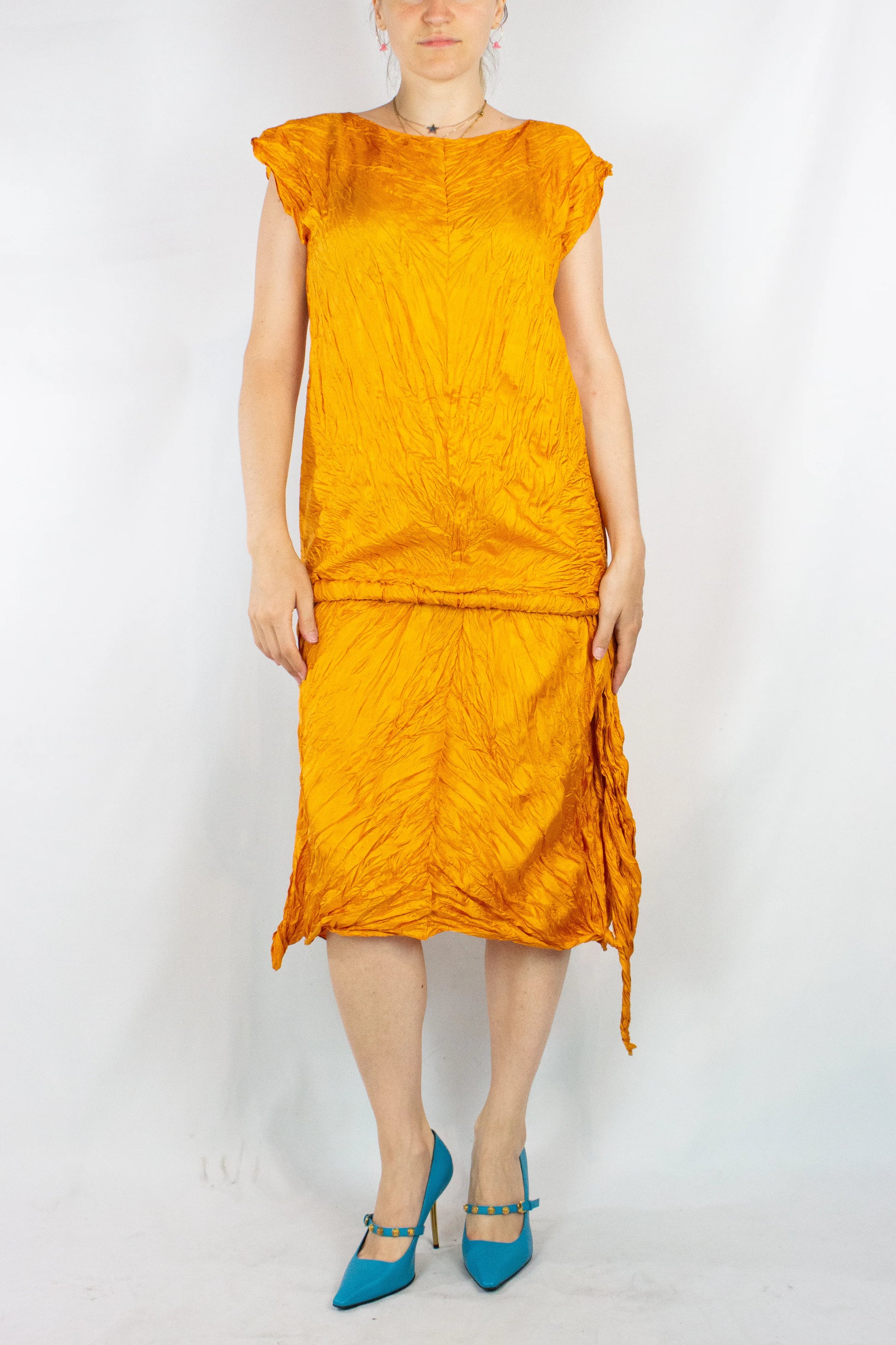 Orange crinkled pleats dress
