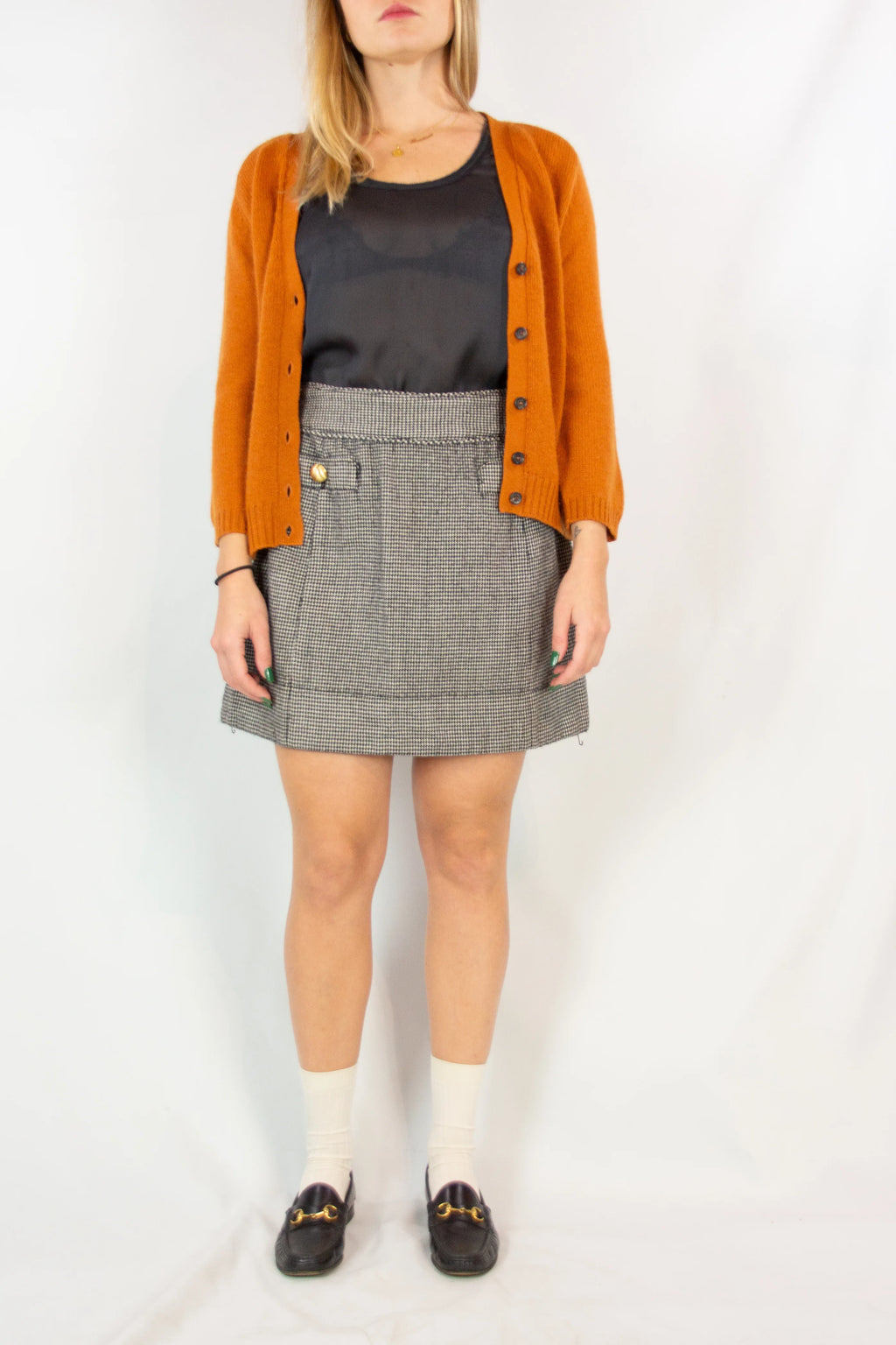 Pied de poule miniskirt with golden buttons