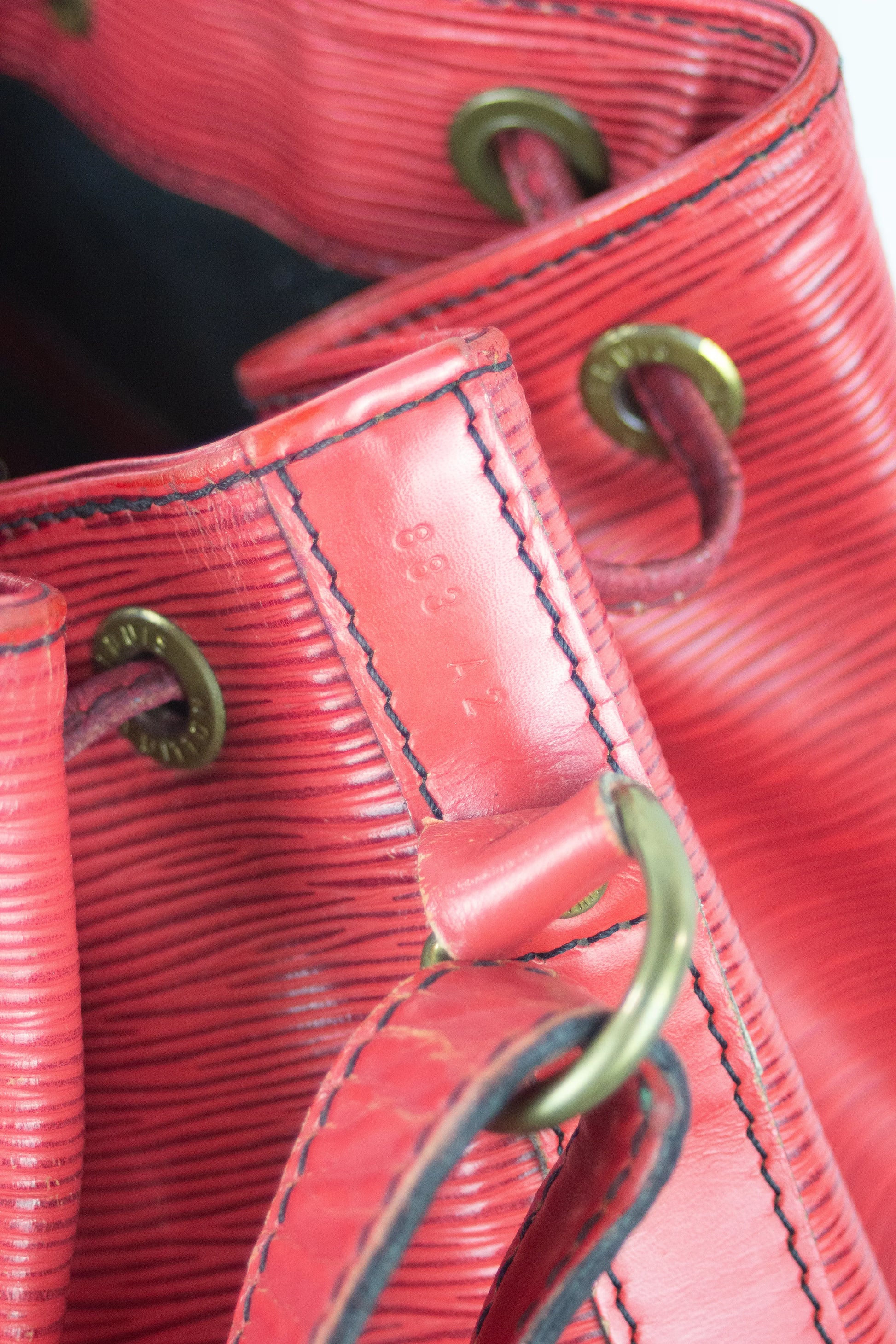 Noé in red Epi leather