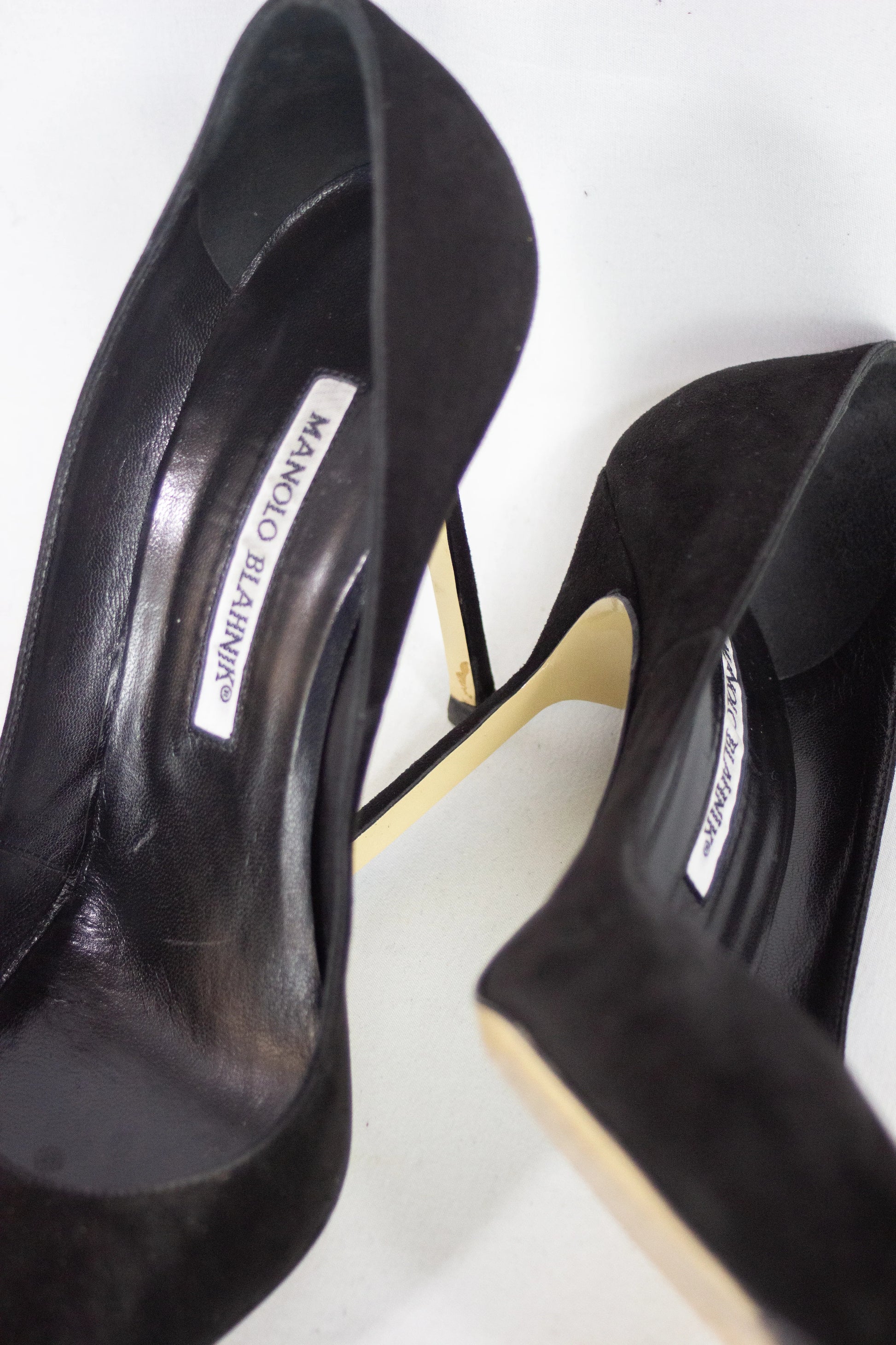 Black suede pumps