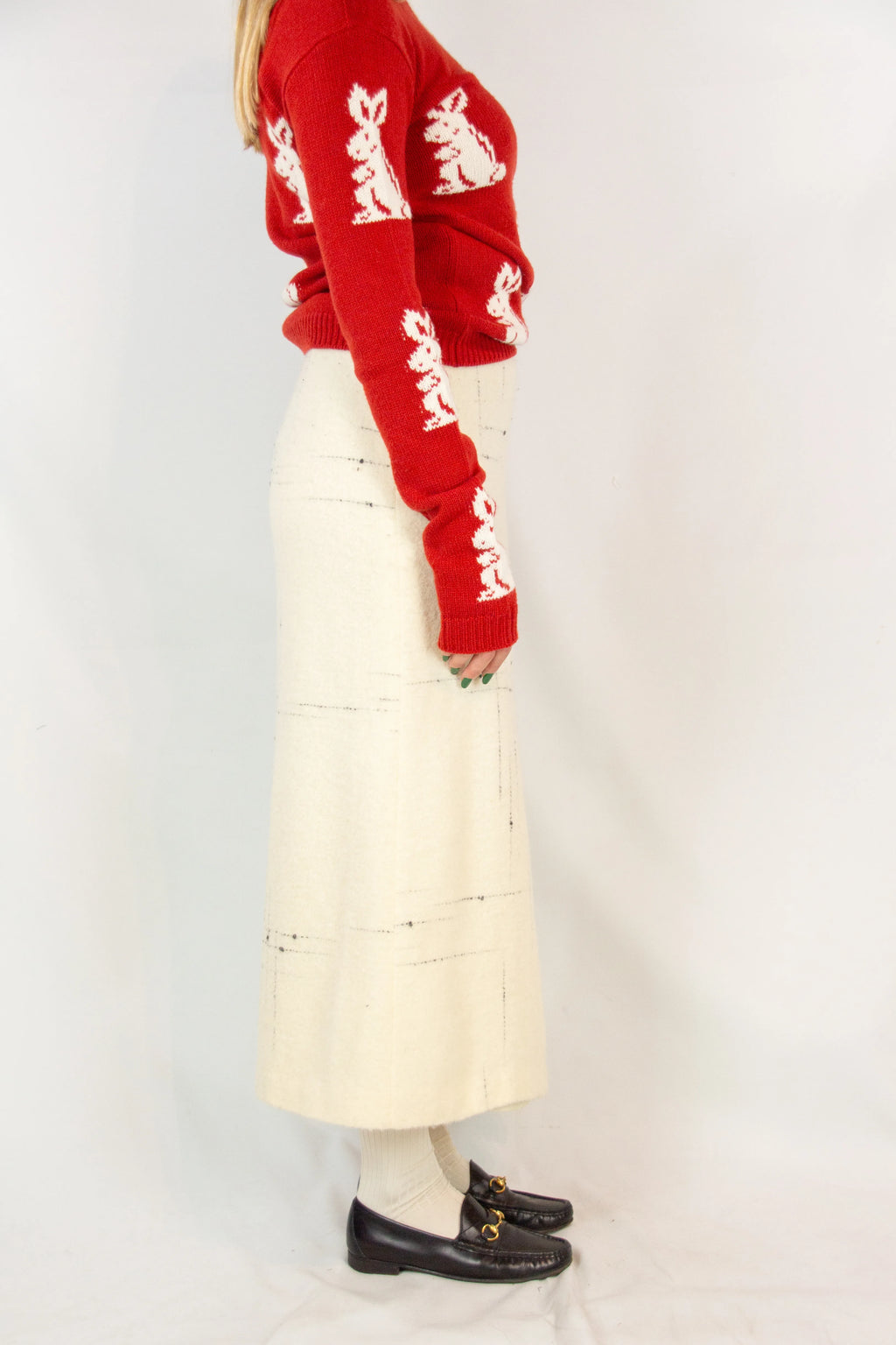 Wool wrap skirt with black stitching and leather closure