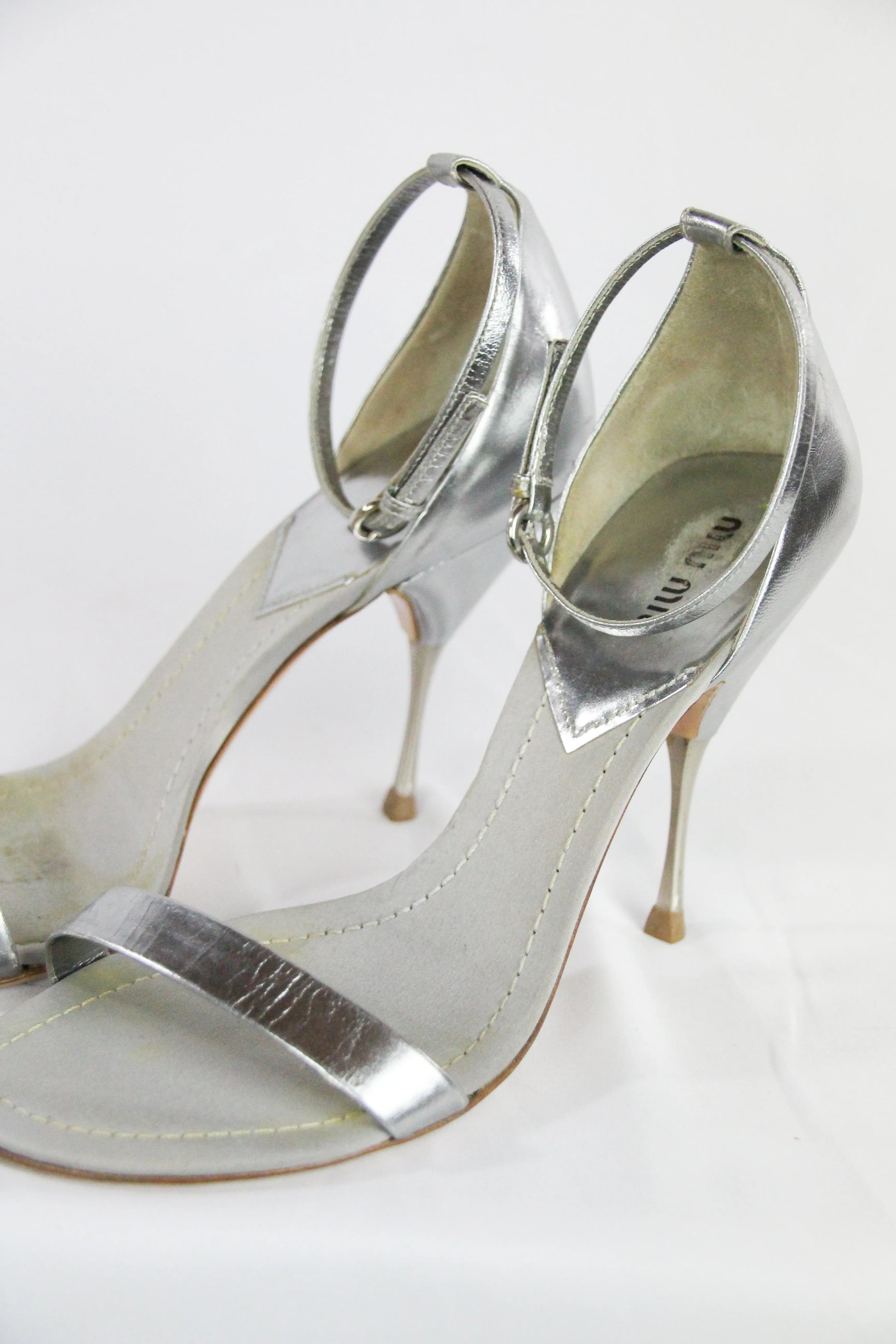 Silver sandals with ankle strap