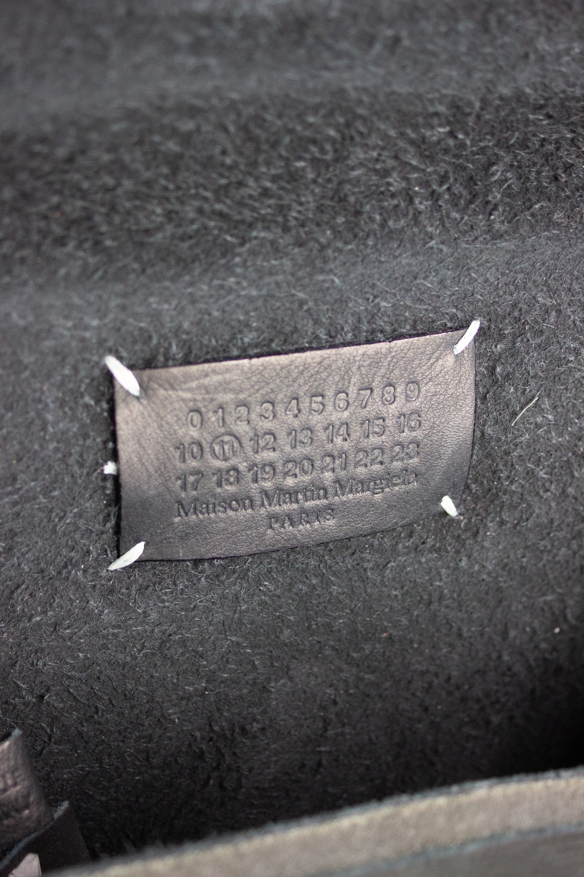 Asymmetric neoprene pochette