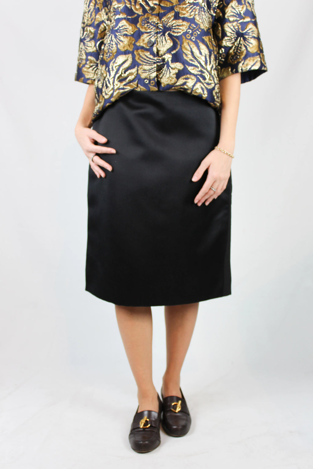 Black silk gabardine skirt with grosgrain side bands