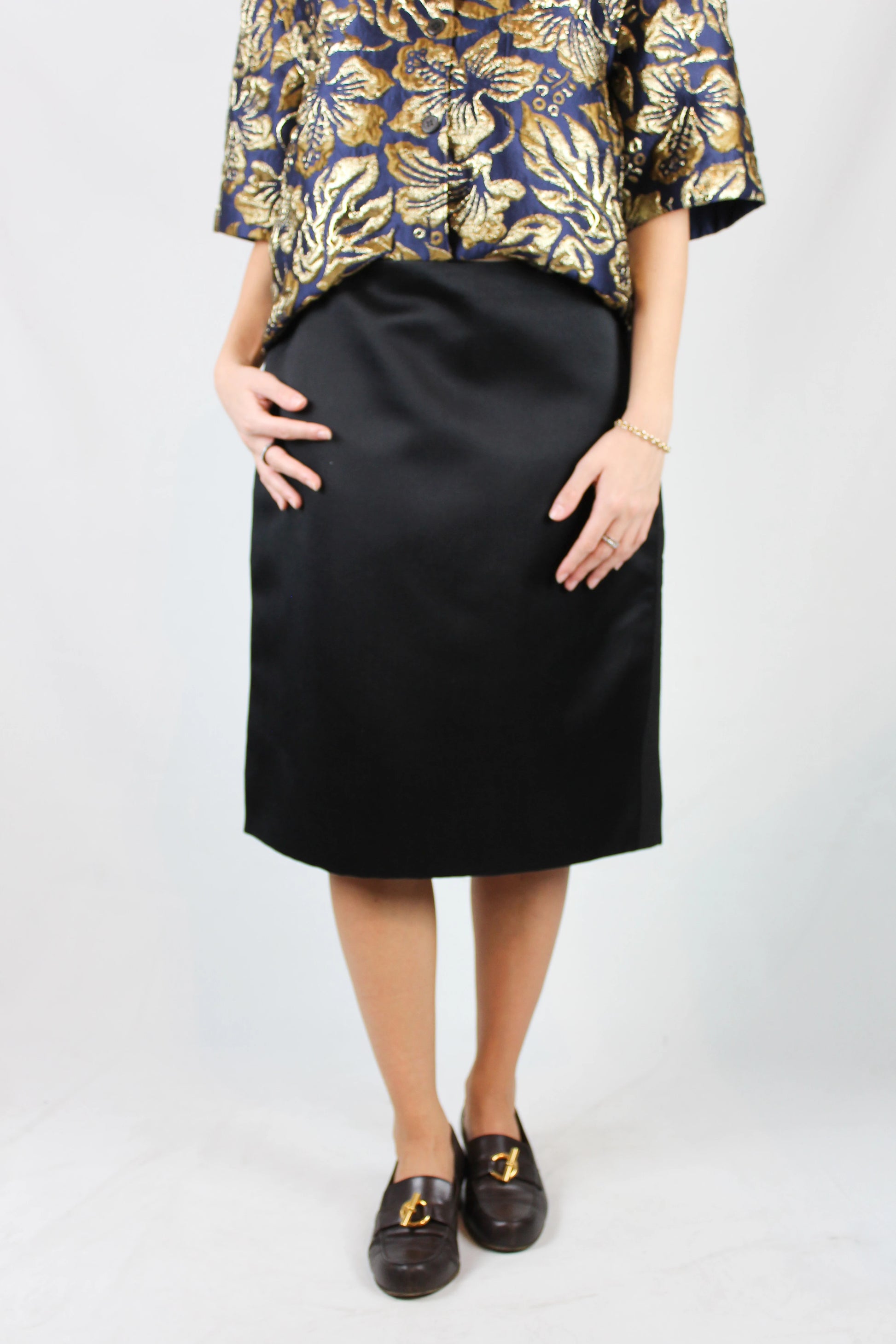 Black silk gabardine skirt with grosgrain side bands