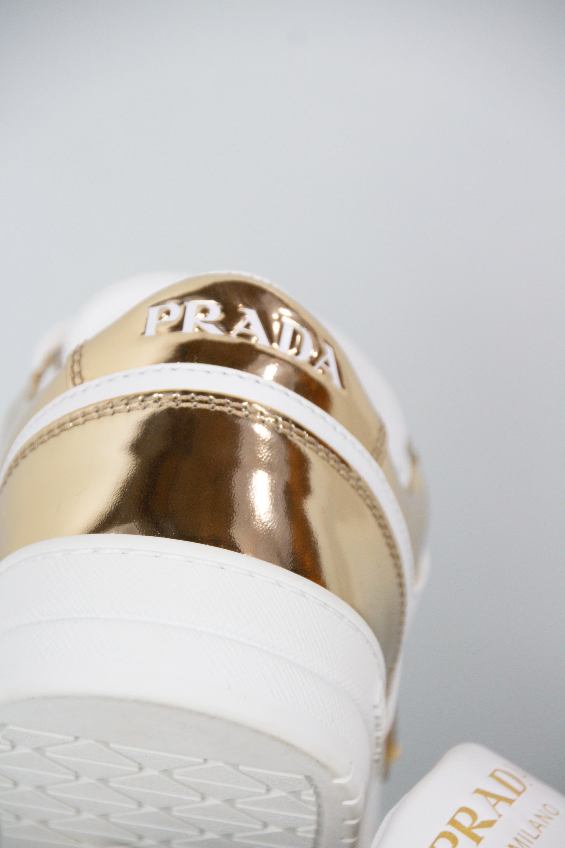 White and gold Downtown sneakers