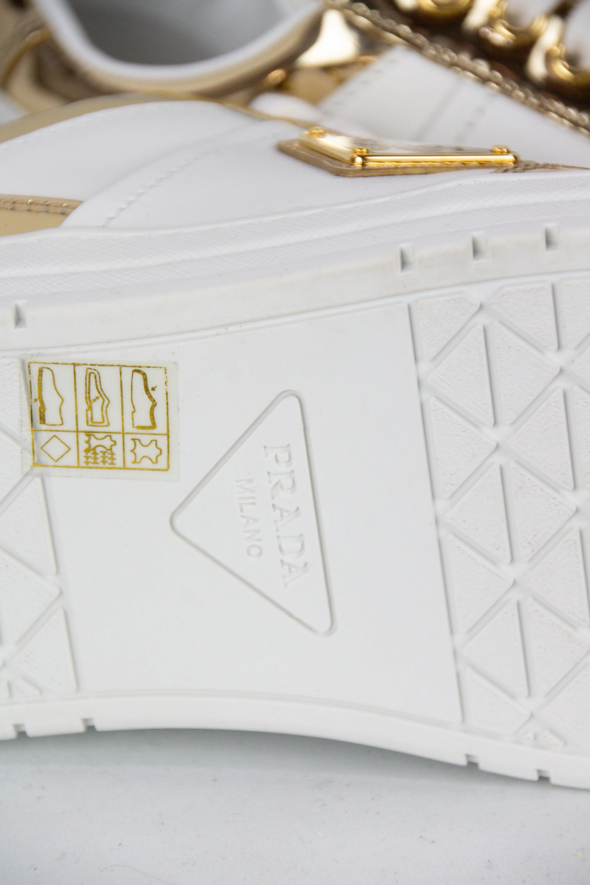 White and gold Downtown sneakers