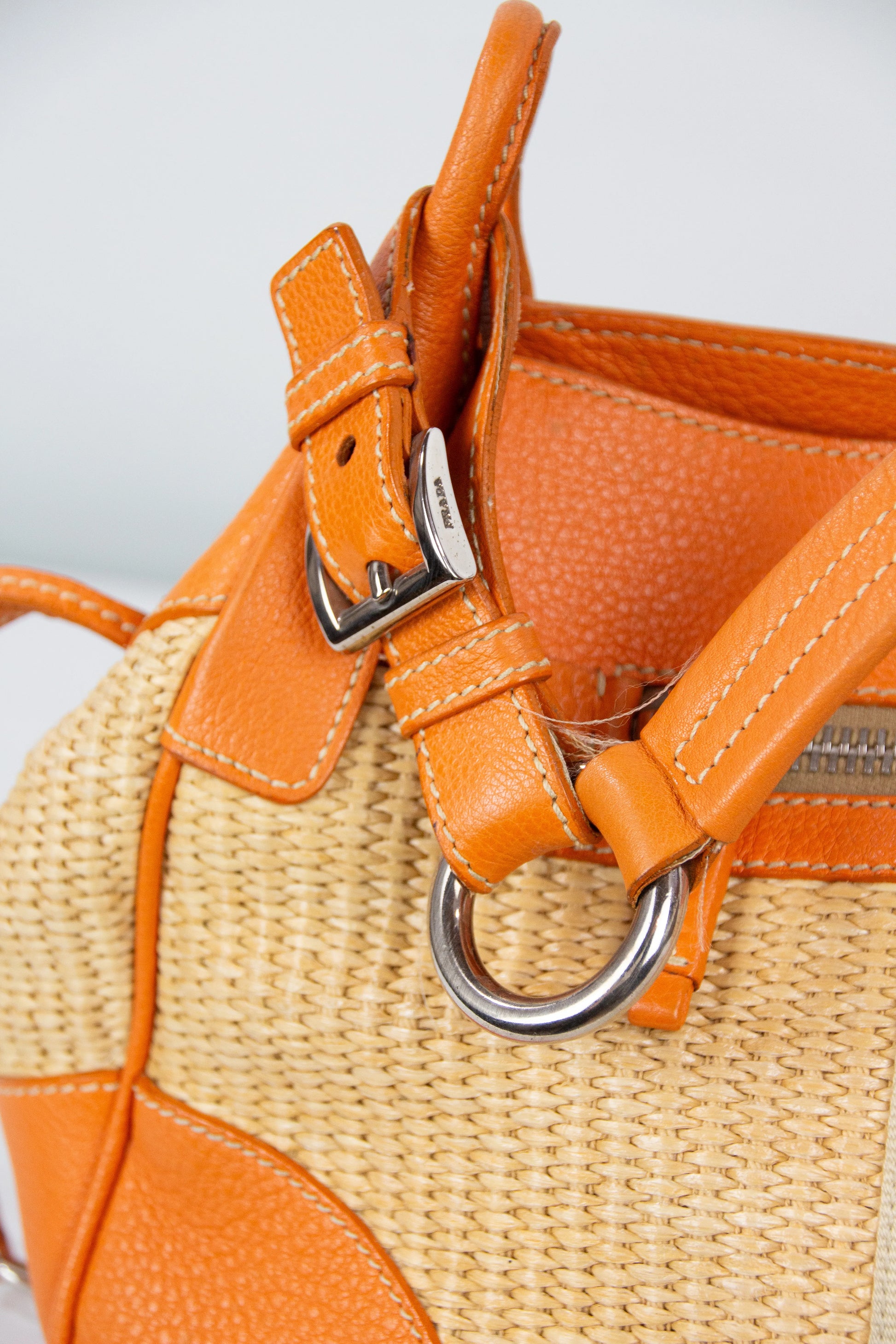 Raffia and leather shoulder bag