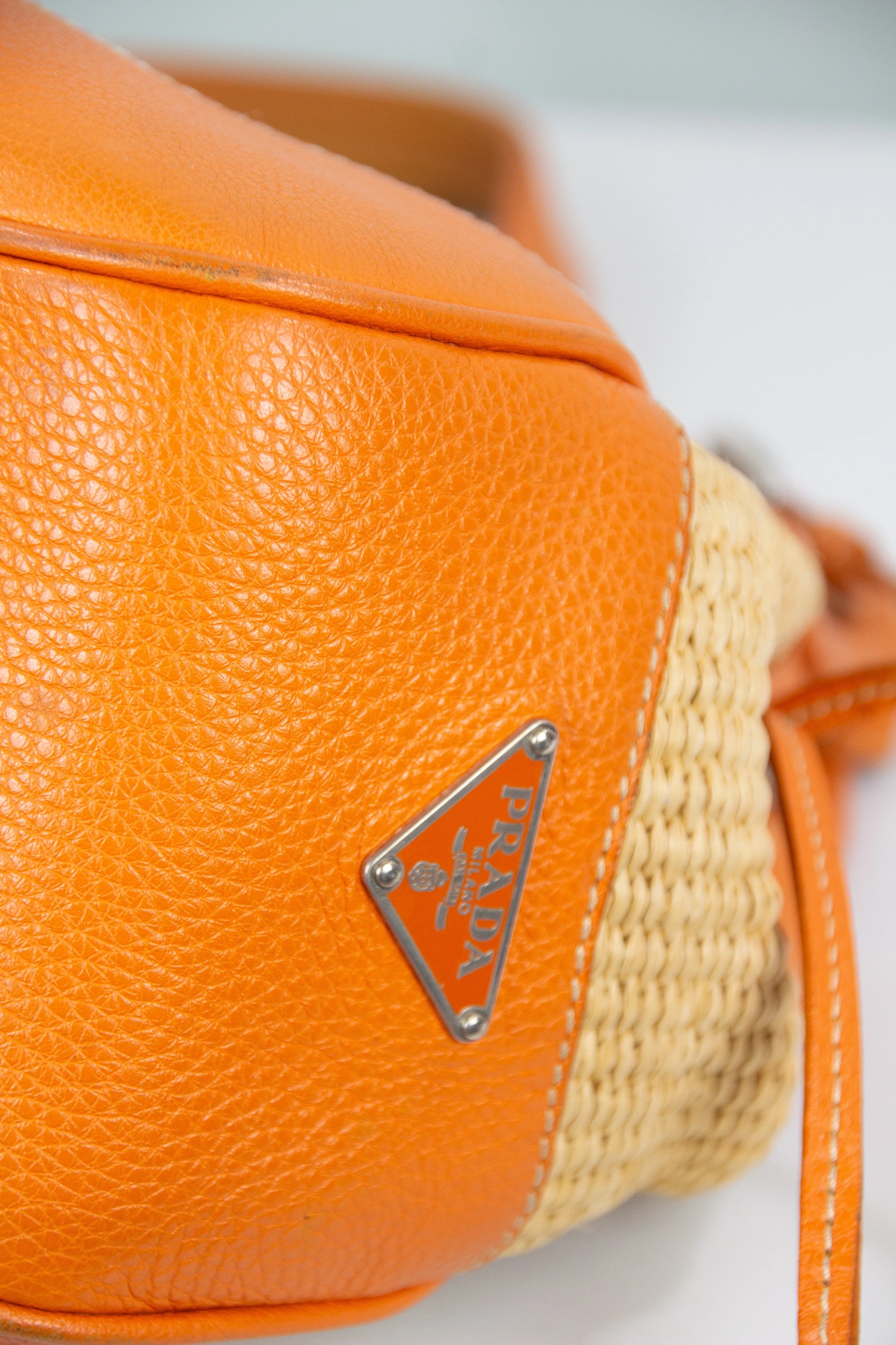 Raffia and leather shoulder bag
