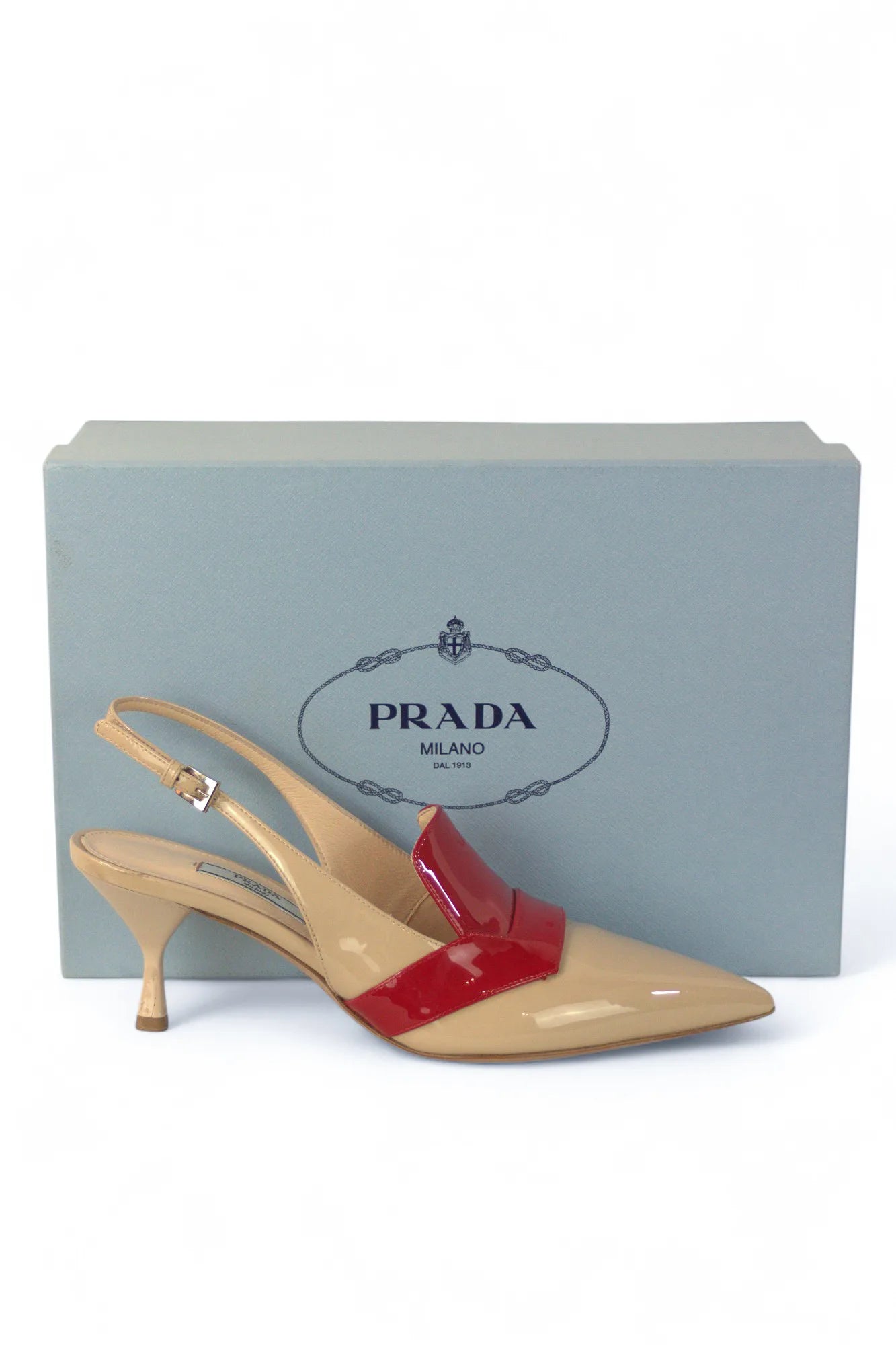 Cream patent pointed slingback