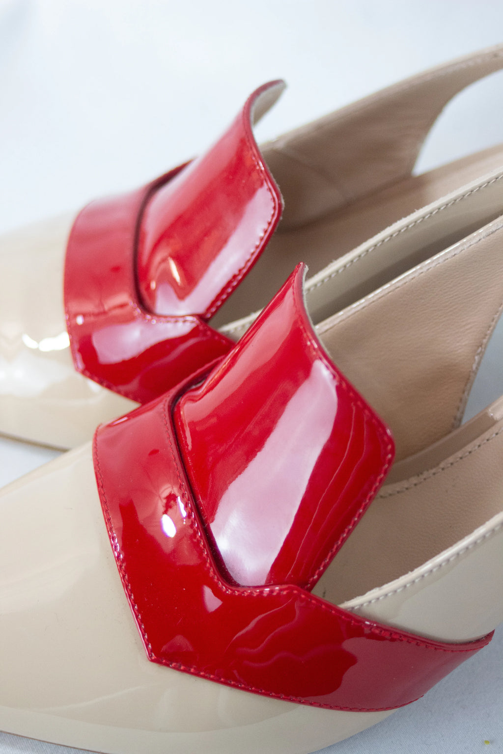 Cream patent pointed slingback