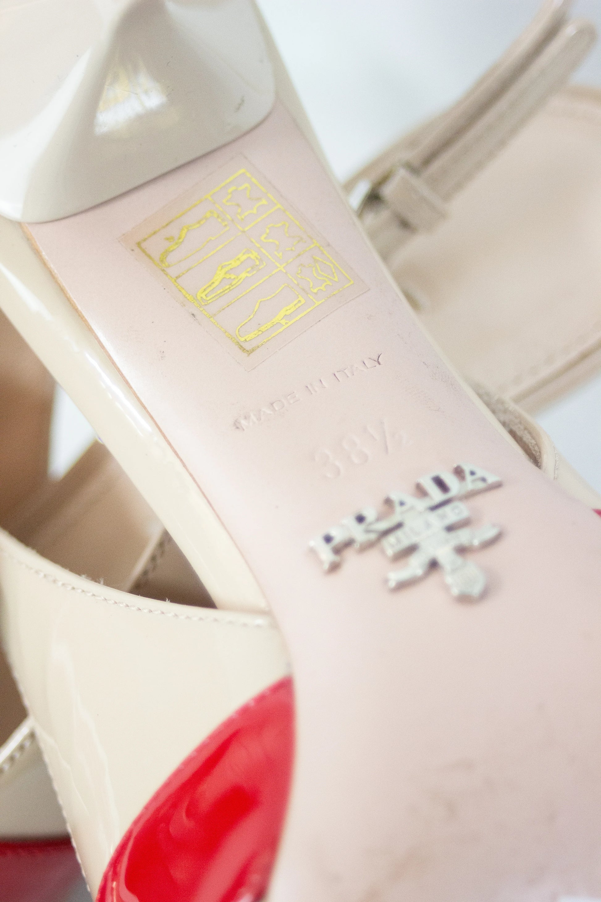Cream patent pointed slingback