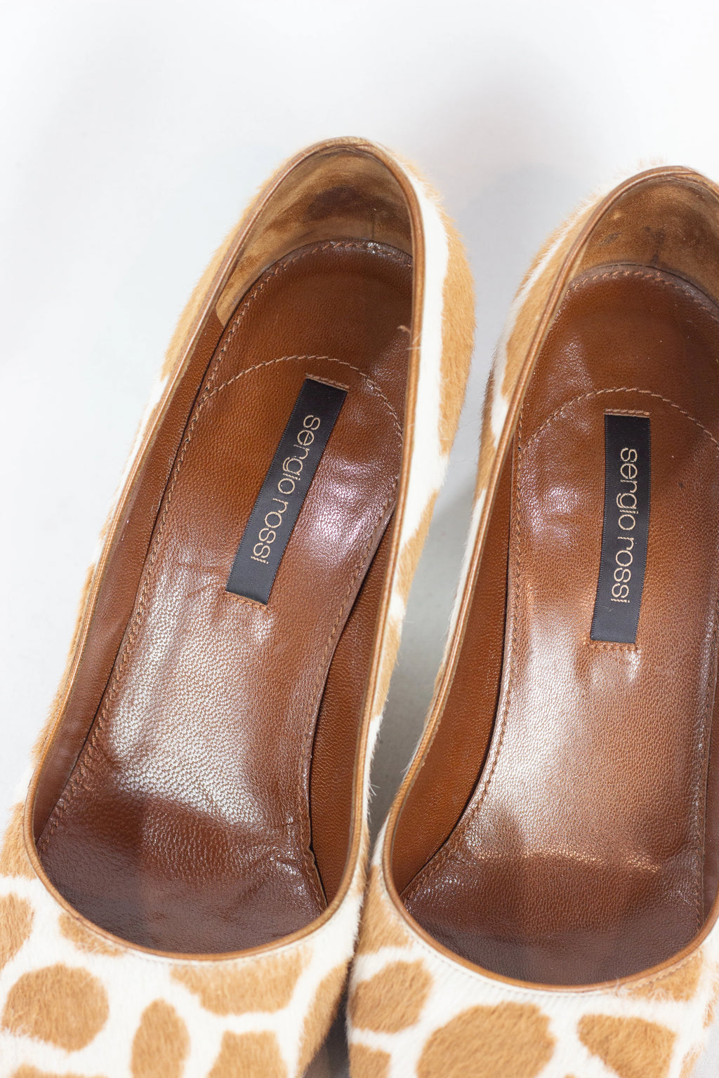 Pony hair wedge pumps