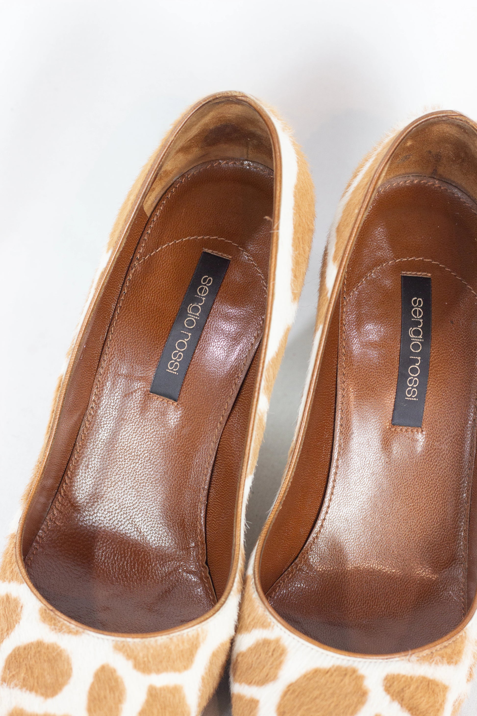 Pony hair wedge pumps