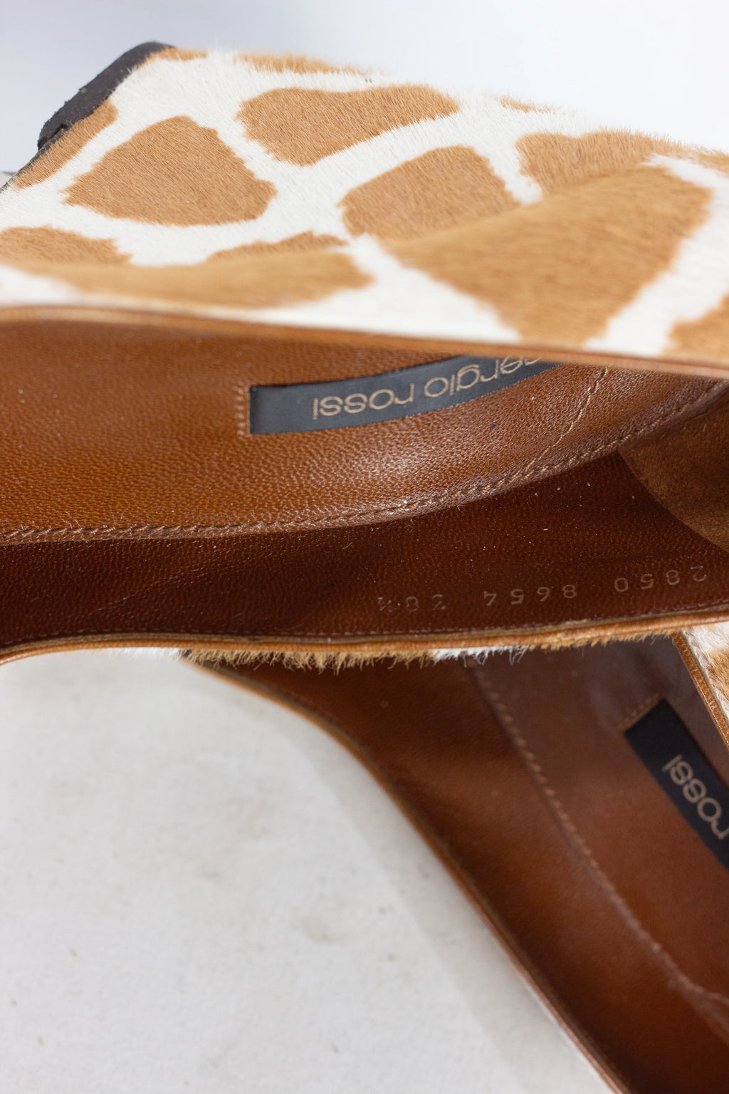 Pony hair wedge pumps