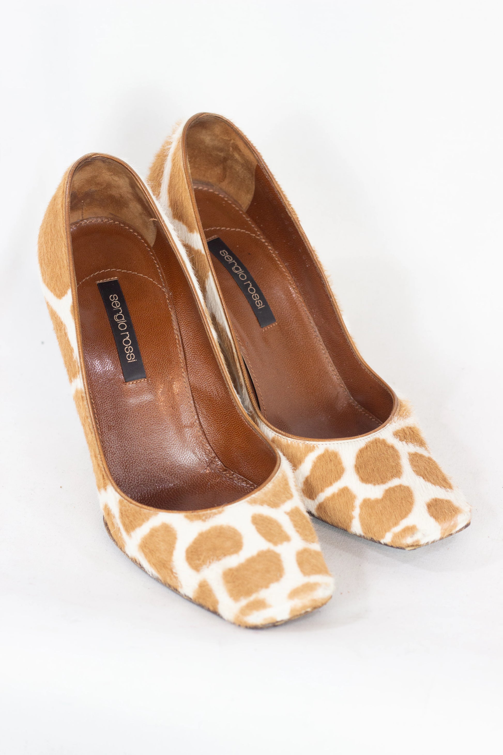 Pony hair wedge pumps