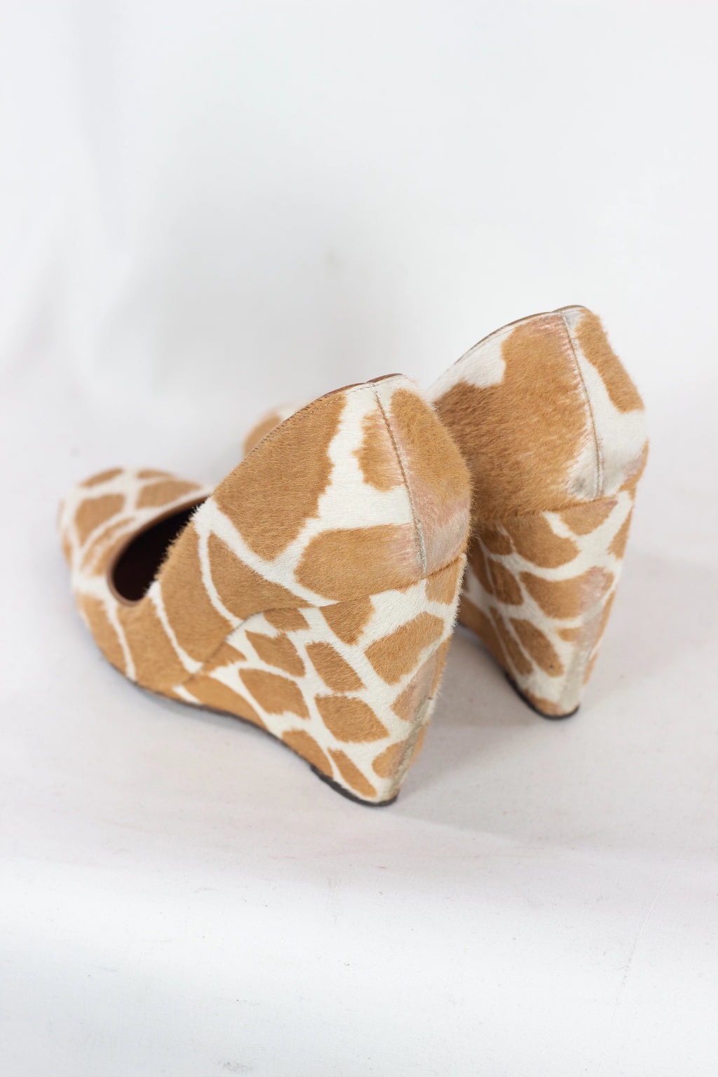 Pony hair wedge pumps