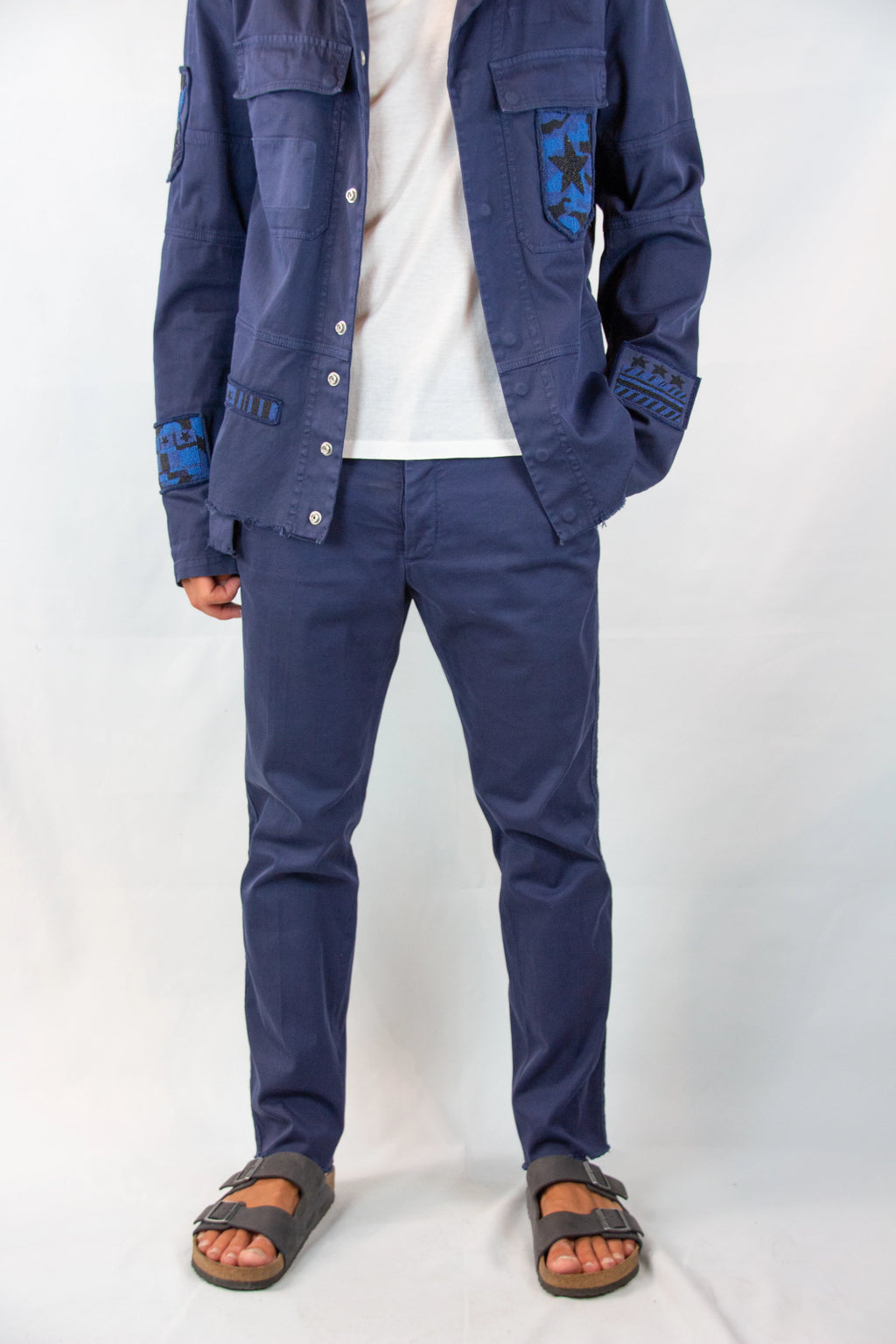 Blue Denim Trousers with Distressed Hem SS2017