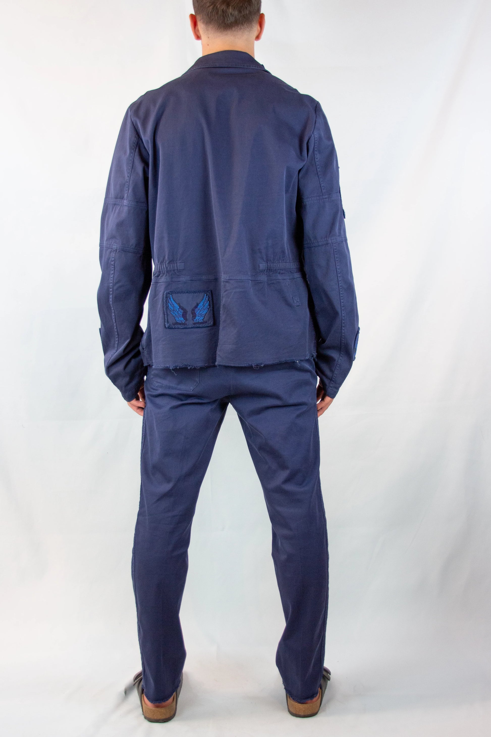 Blue Denim Trousers with Distressed Hem SS2017