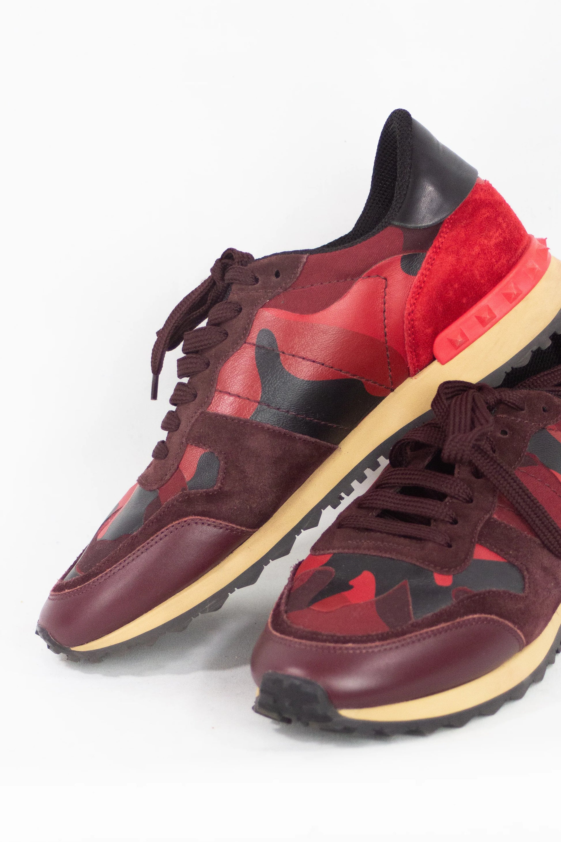 Red rockstud sneakers