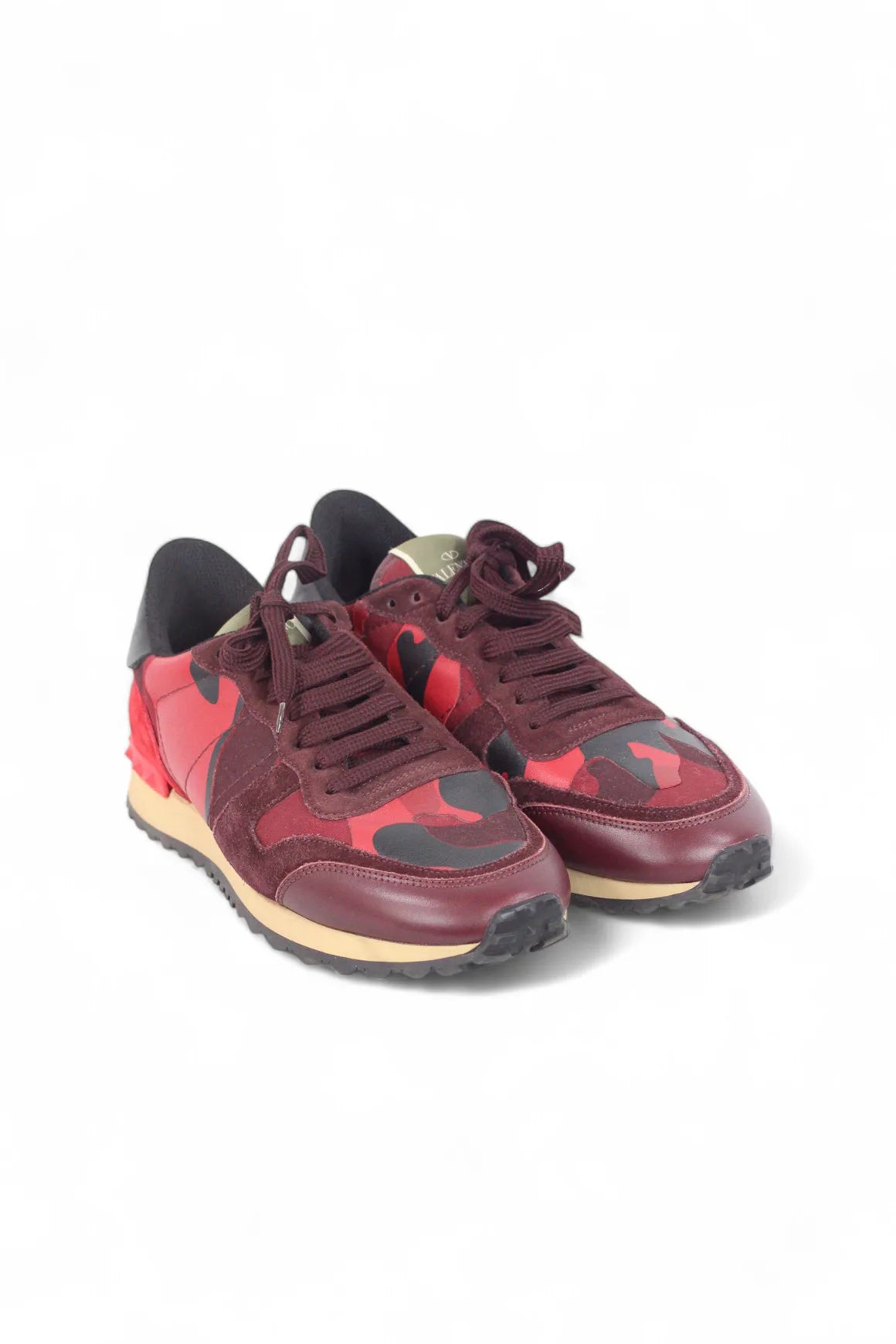Red rockstud sneakers