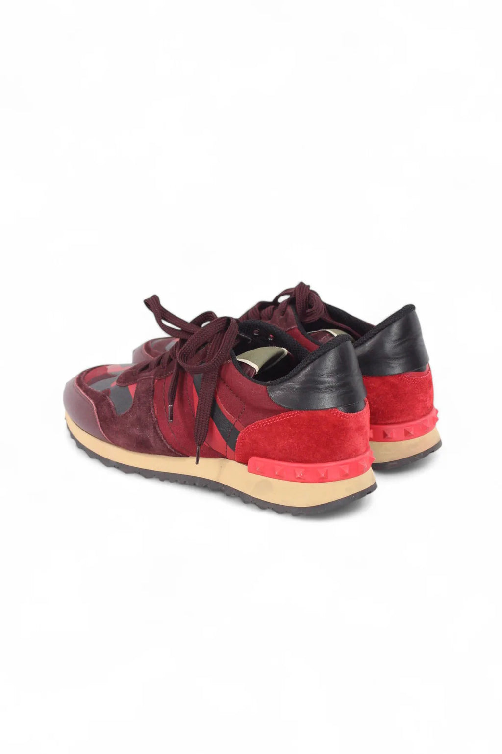 Red rockstud sneakers
