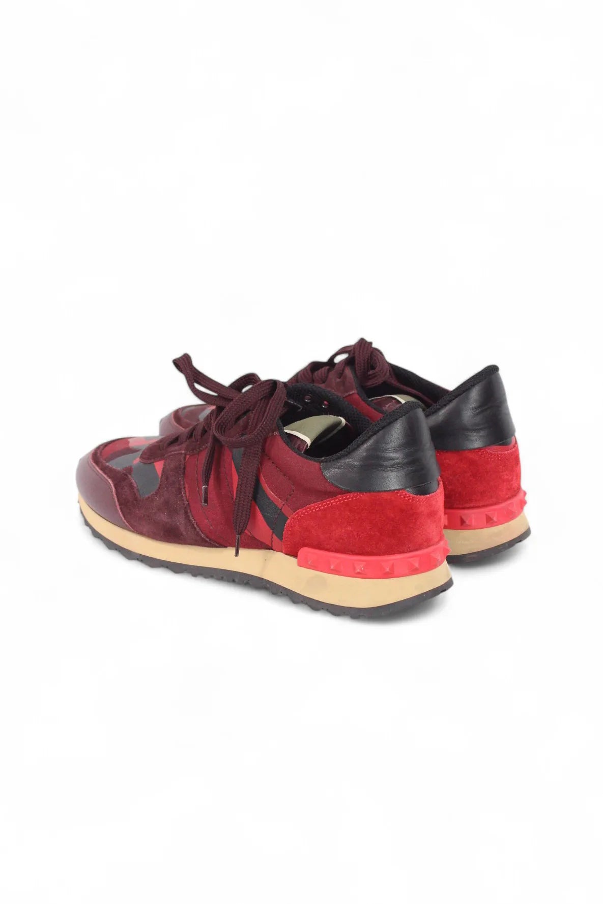 Red rockstud sneakers