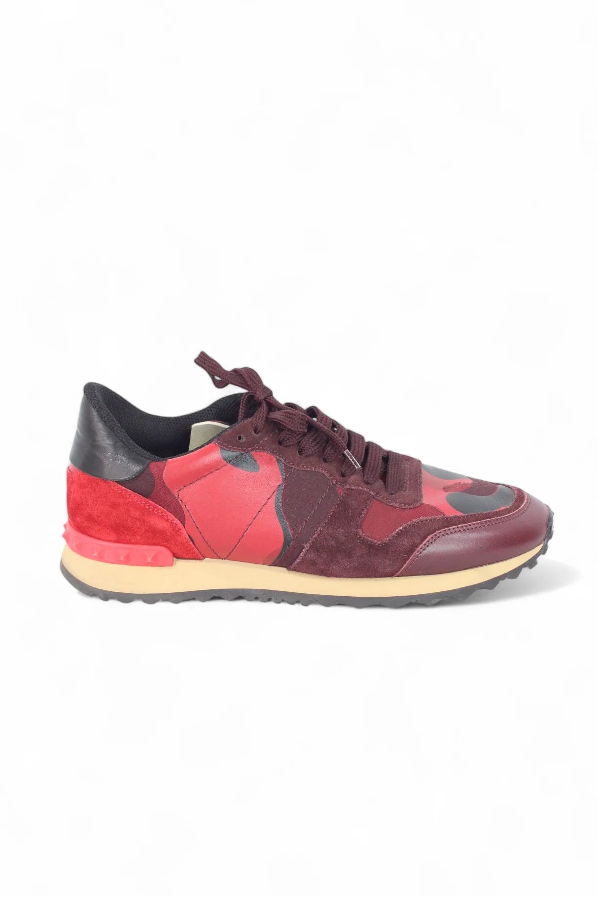 Red rockstud sneakers