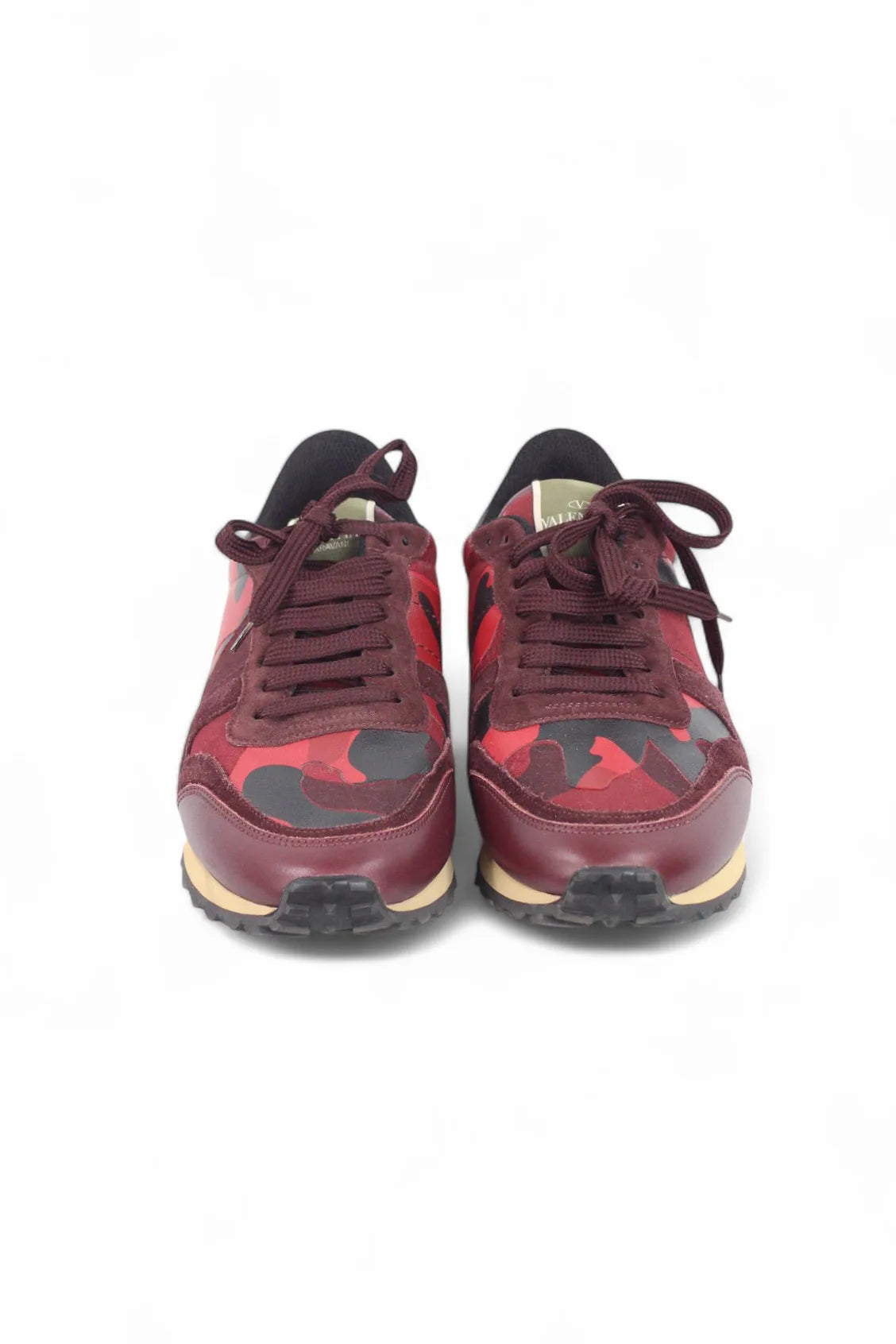 Red rockstud sneakers