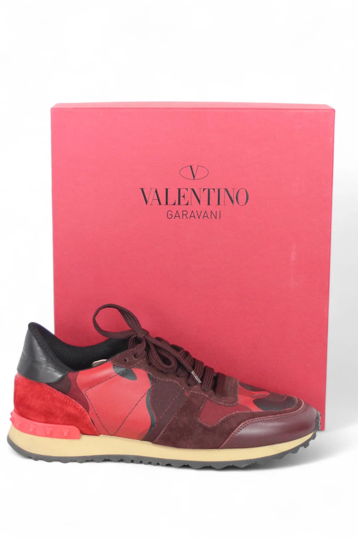 Red rockstud sneakers