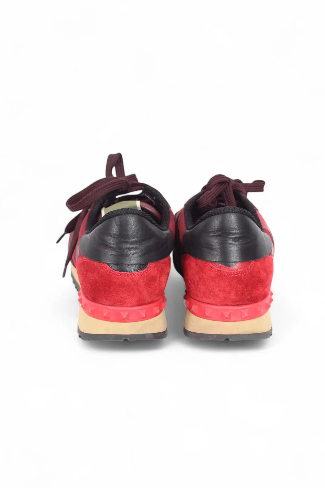 Red rockstud sneakers