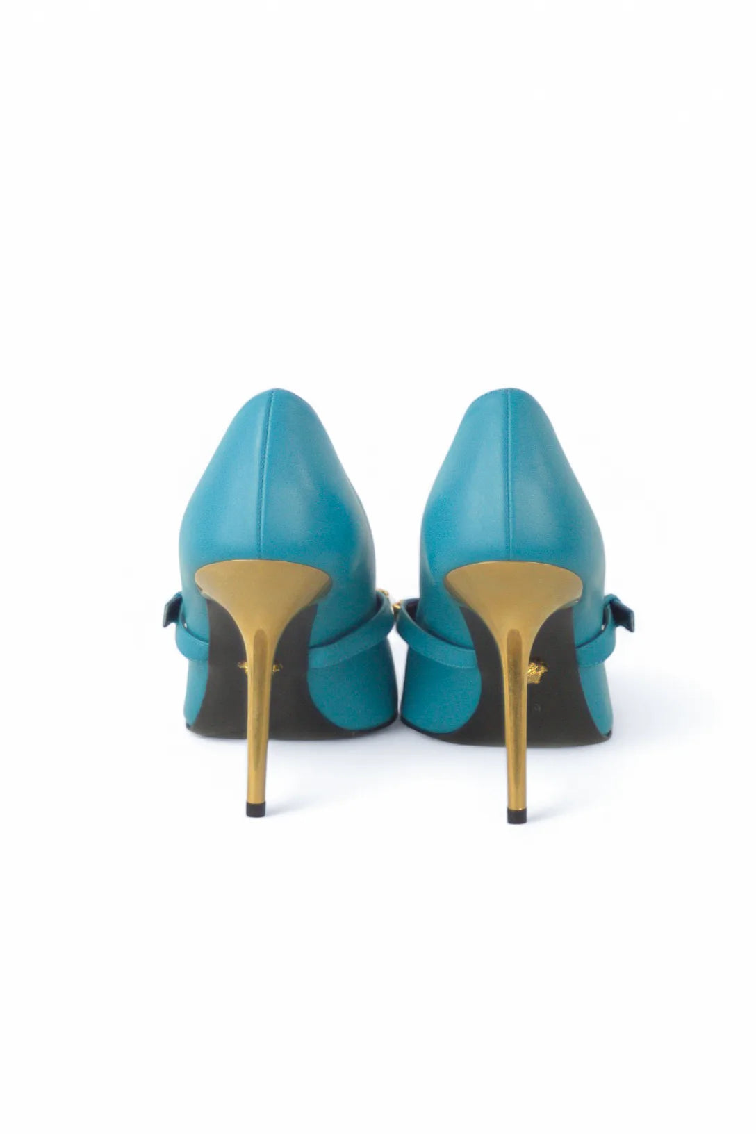 Teal pumps with Medusa logo